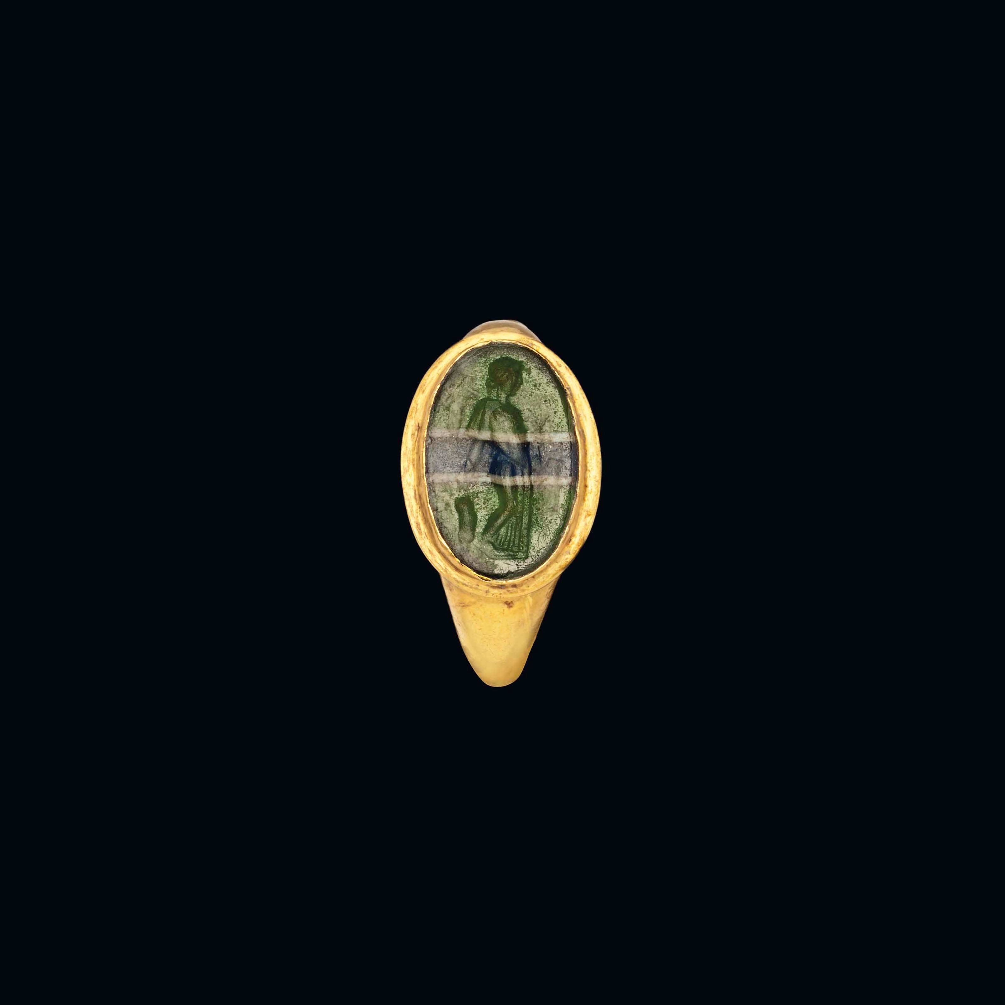 A ROMAN GOLD AND GLASS RING