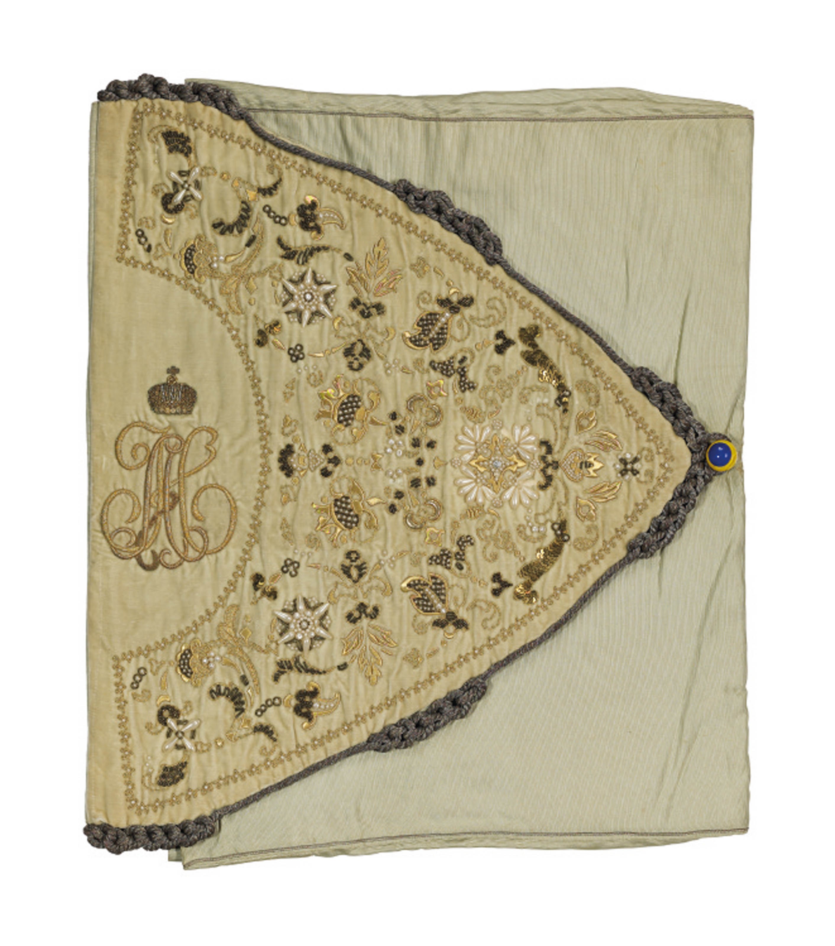 NICHOLAS II -- A pale-green silk and velvet embroidered document pouch. Russia, circa 1890.