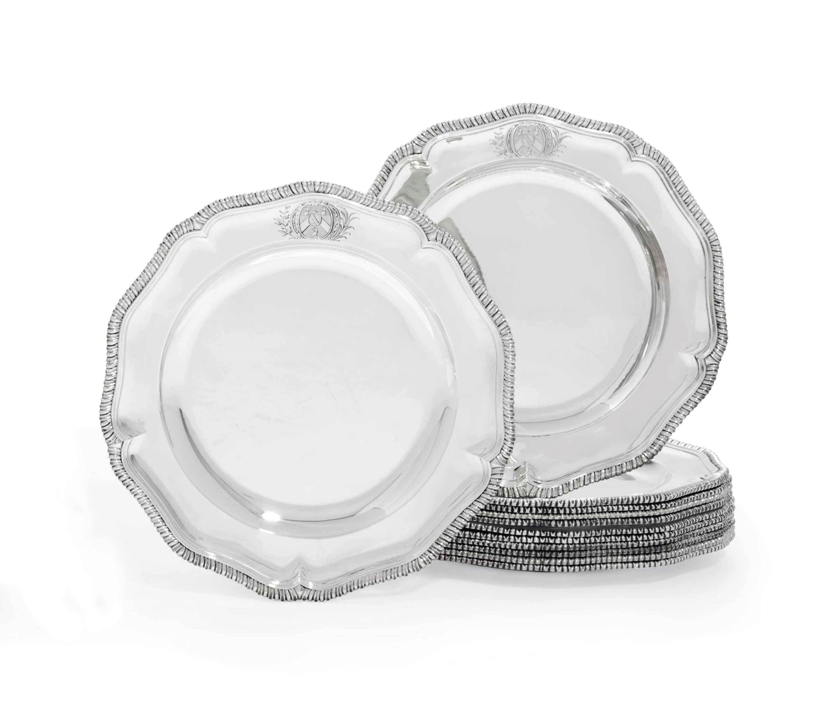 A SET OF TWELVE GEORGE II SILVER DINNER-PLATES