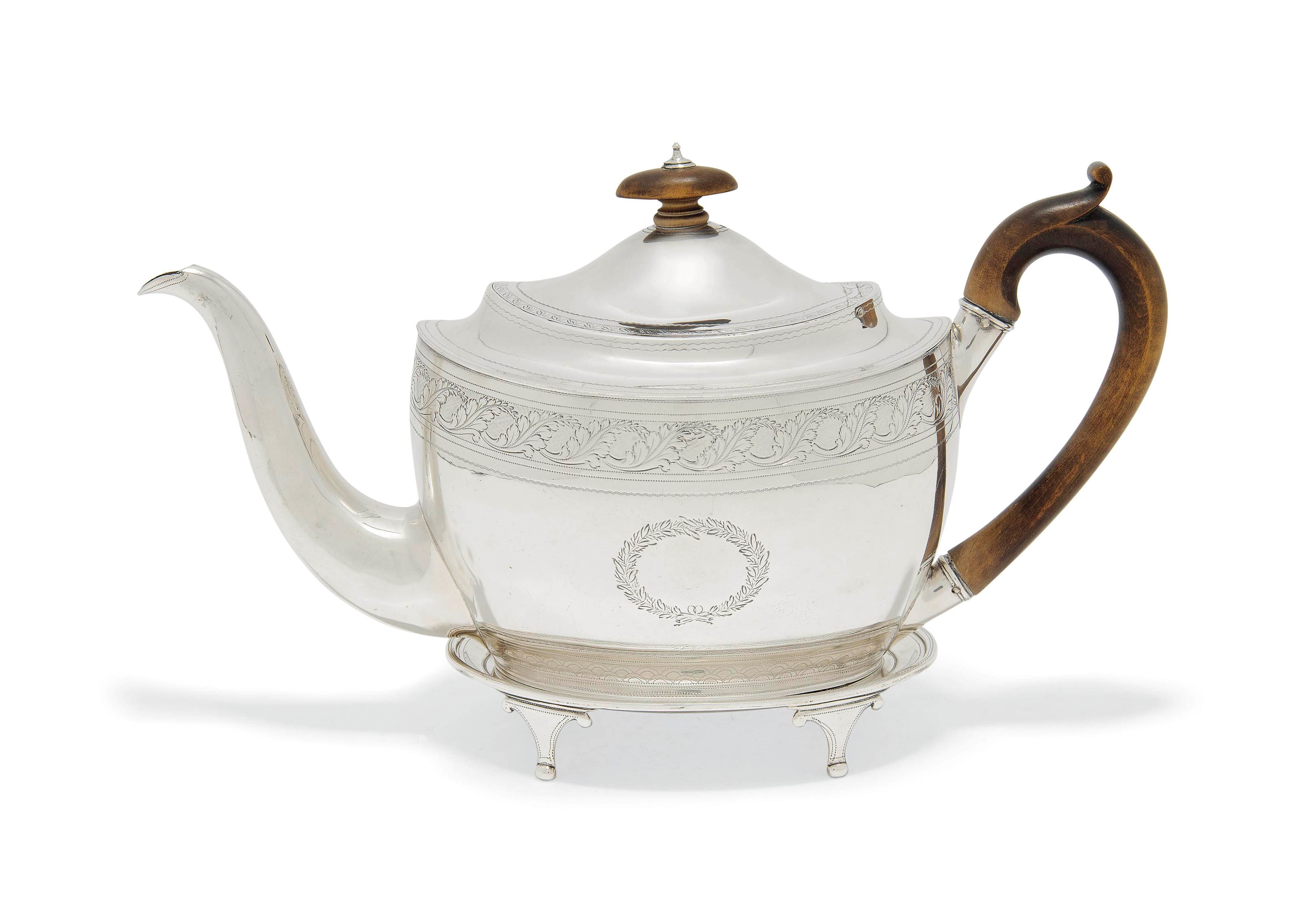 A GEORGE III SILVER TEAPOT AND STAND