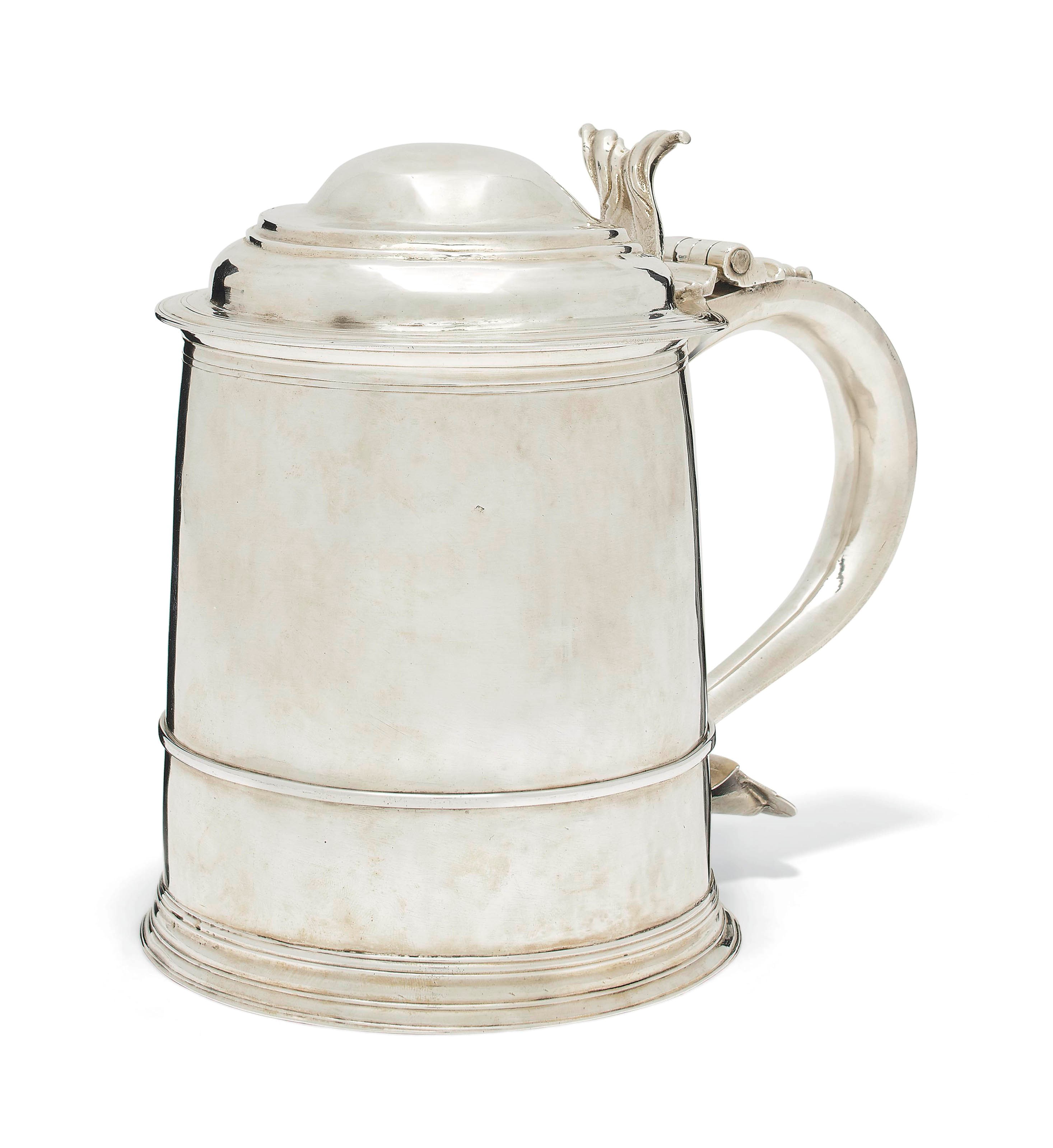 A QUEEN ANNE SILVER TANKARD
