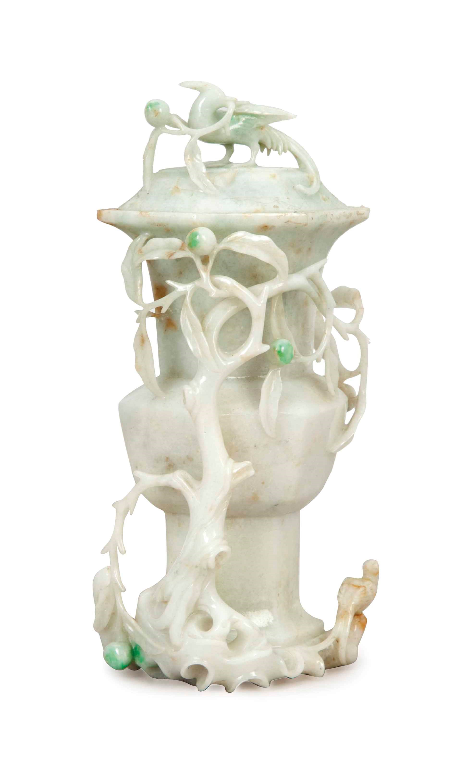 A CHINESE GREEN-FLECKED WHITE JADEITE VASE AND COVER,