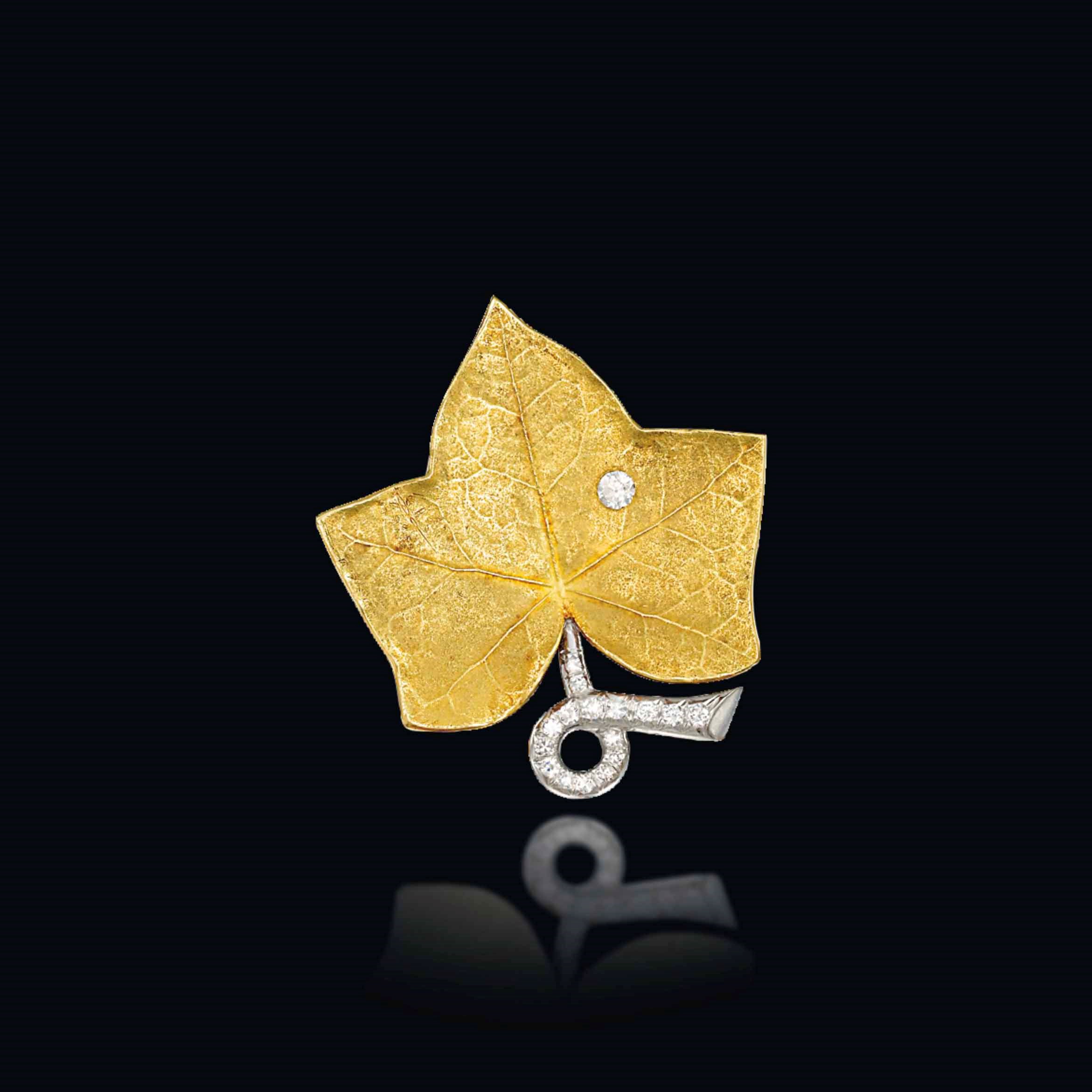 A DIAMOND-SET IVY LEAF CLIP BROOCH, BY CARTIER