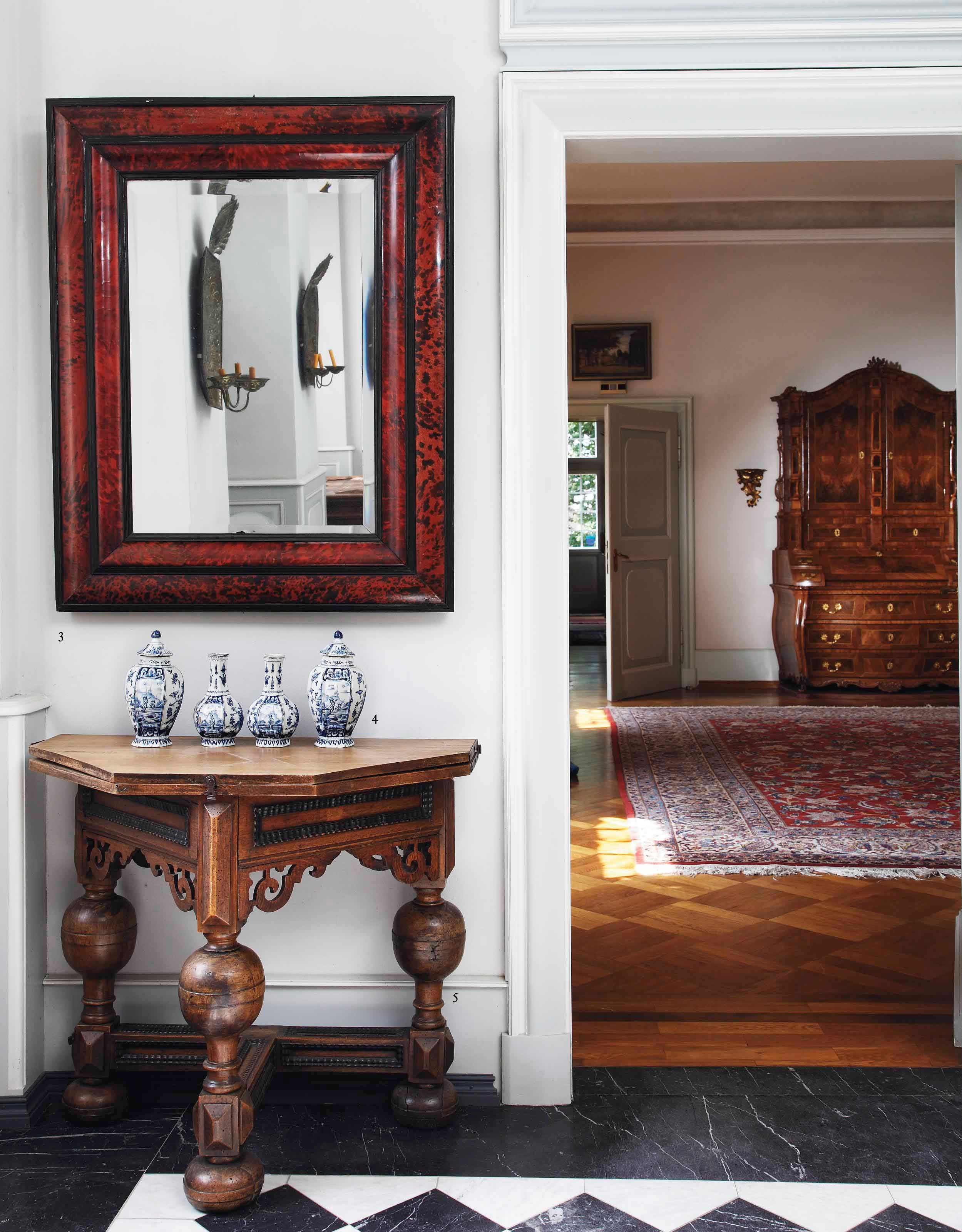 A FLEMISH EBONY AND TORTOISESHELL MIRROR