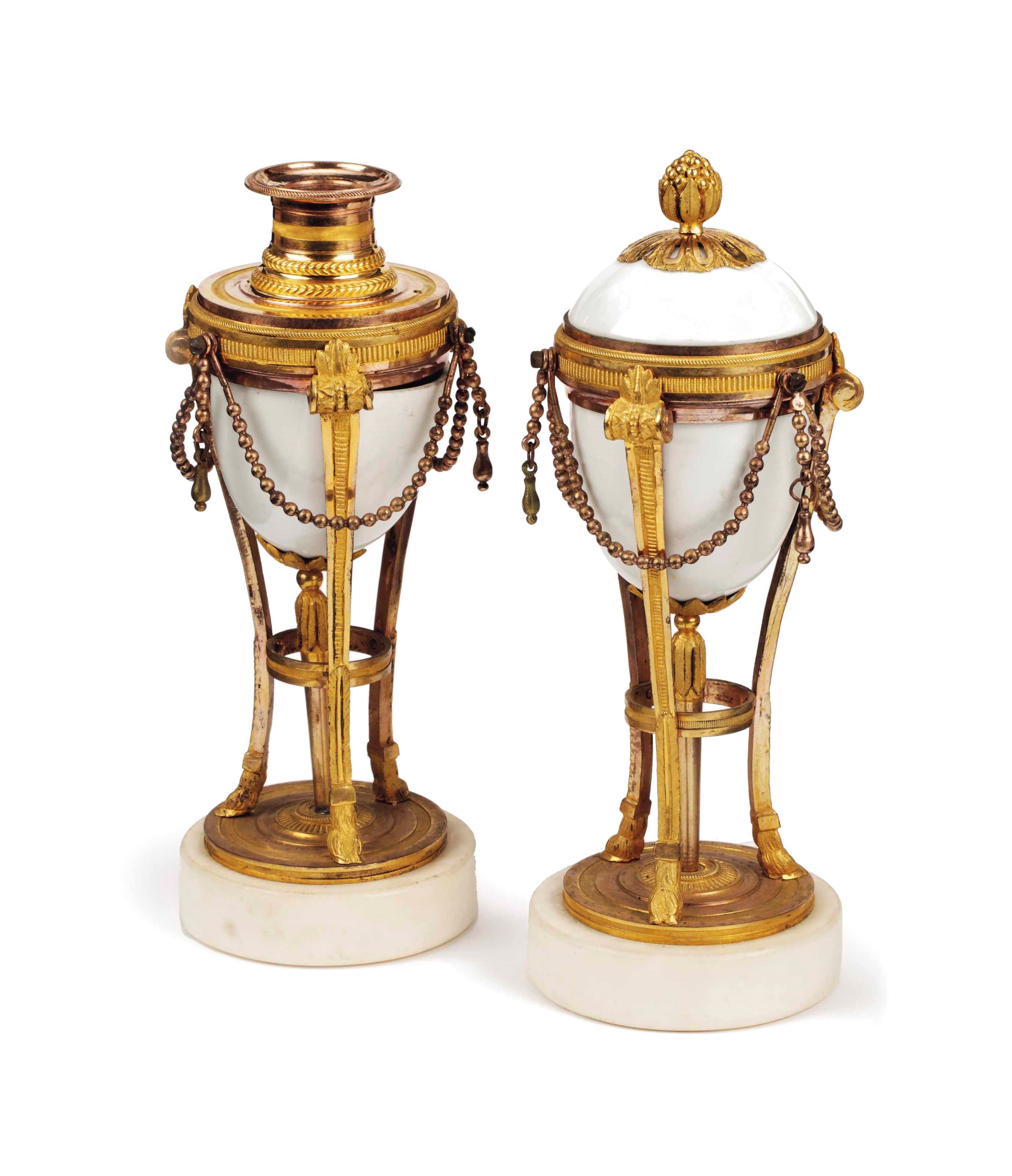 A PAIR OF NORTH EUROPEAN ORMOLU, ALABASTER AND WHITE MARBLE CASSOLETTES