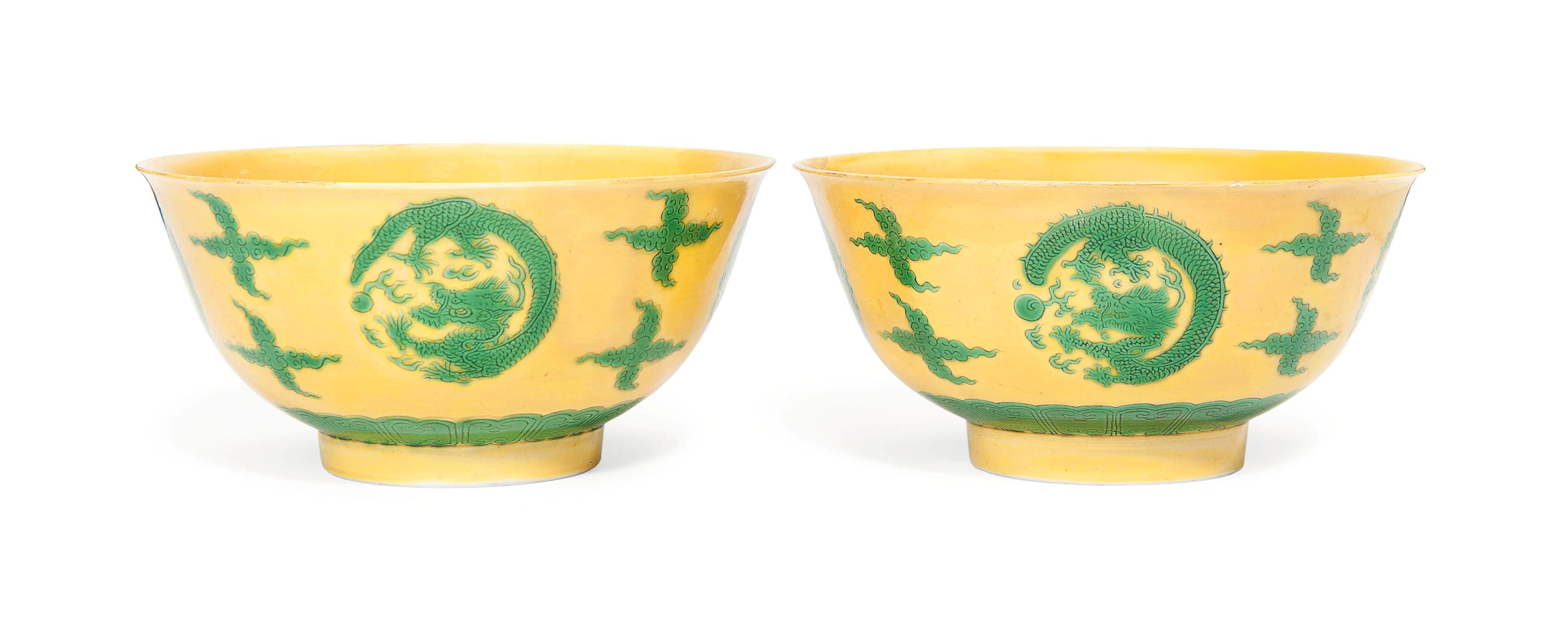 A PAIR OF YELLOW AND GREEN-GLAZED DRAGON BOWLS