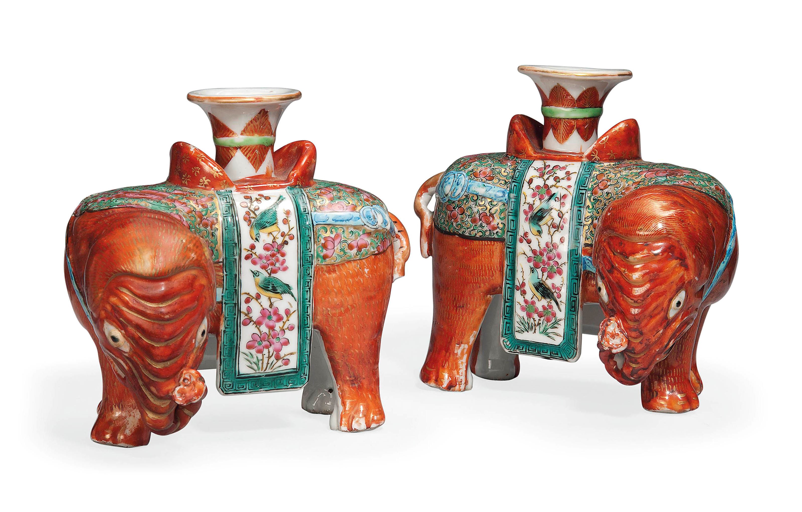 A PAIR OF CANTONESE FAMILLE ROSE ELEPHANT JOSS STICK HOLDERS