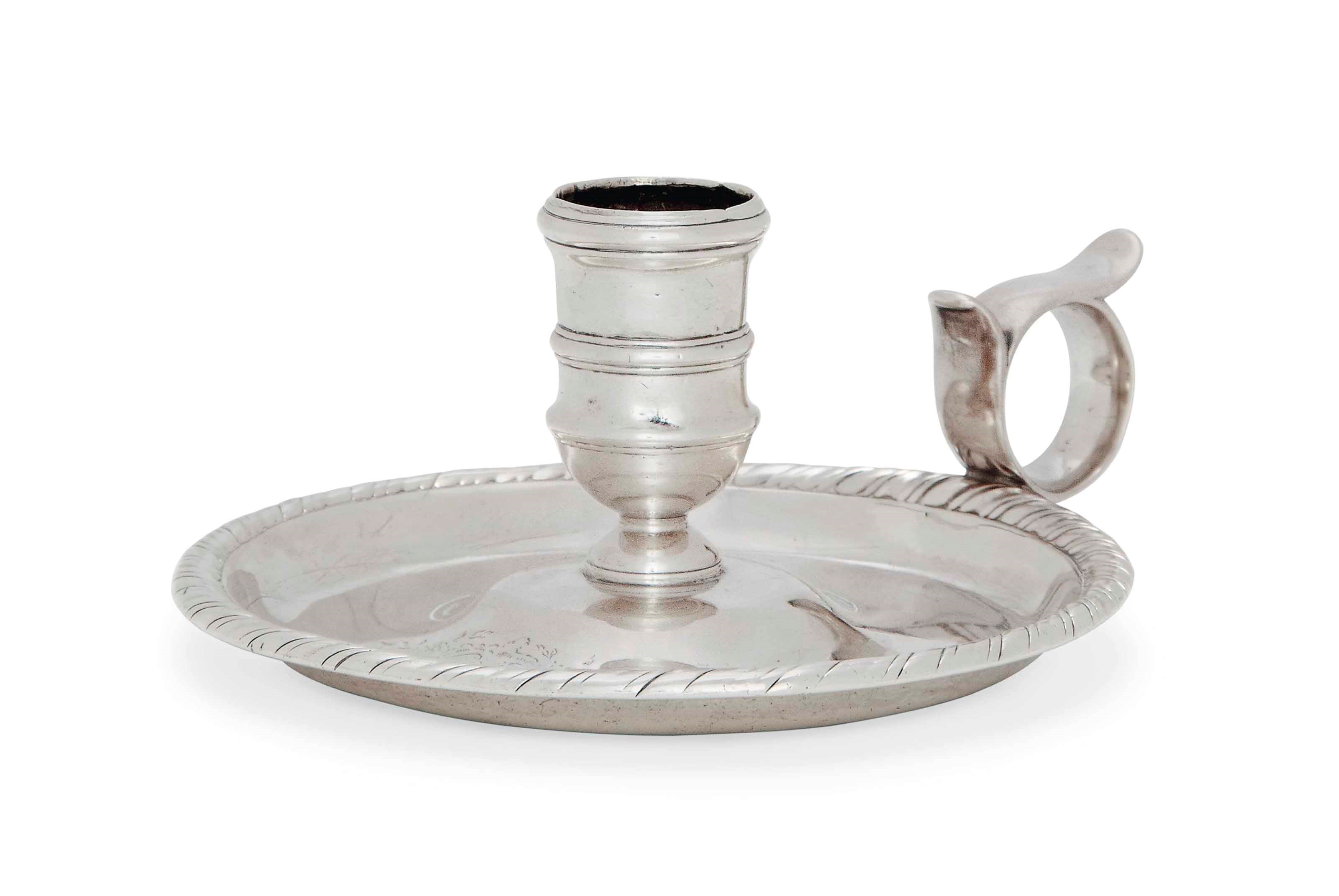 A GEORGE III PROVINCIAL SILVER CHAMBERSTICK