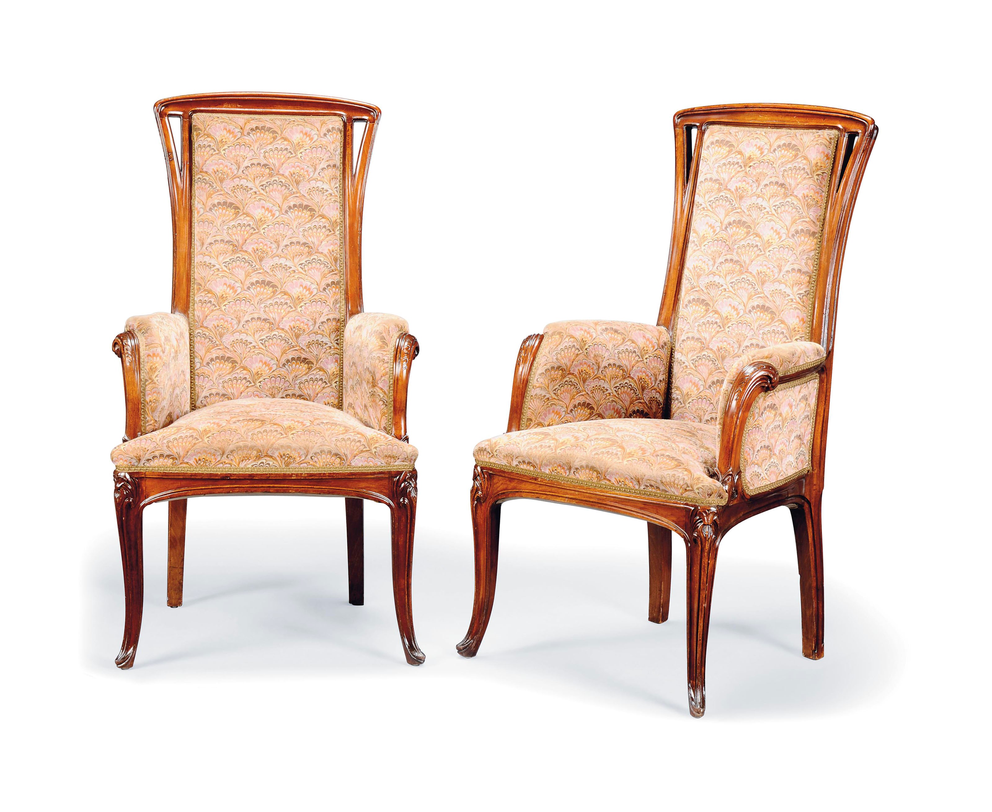 A PAIR OF LOUIS MAJORELLE CARVED MAHOGANY ARMCHAIRS