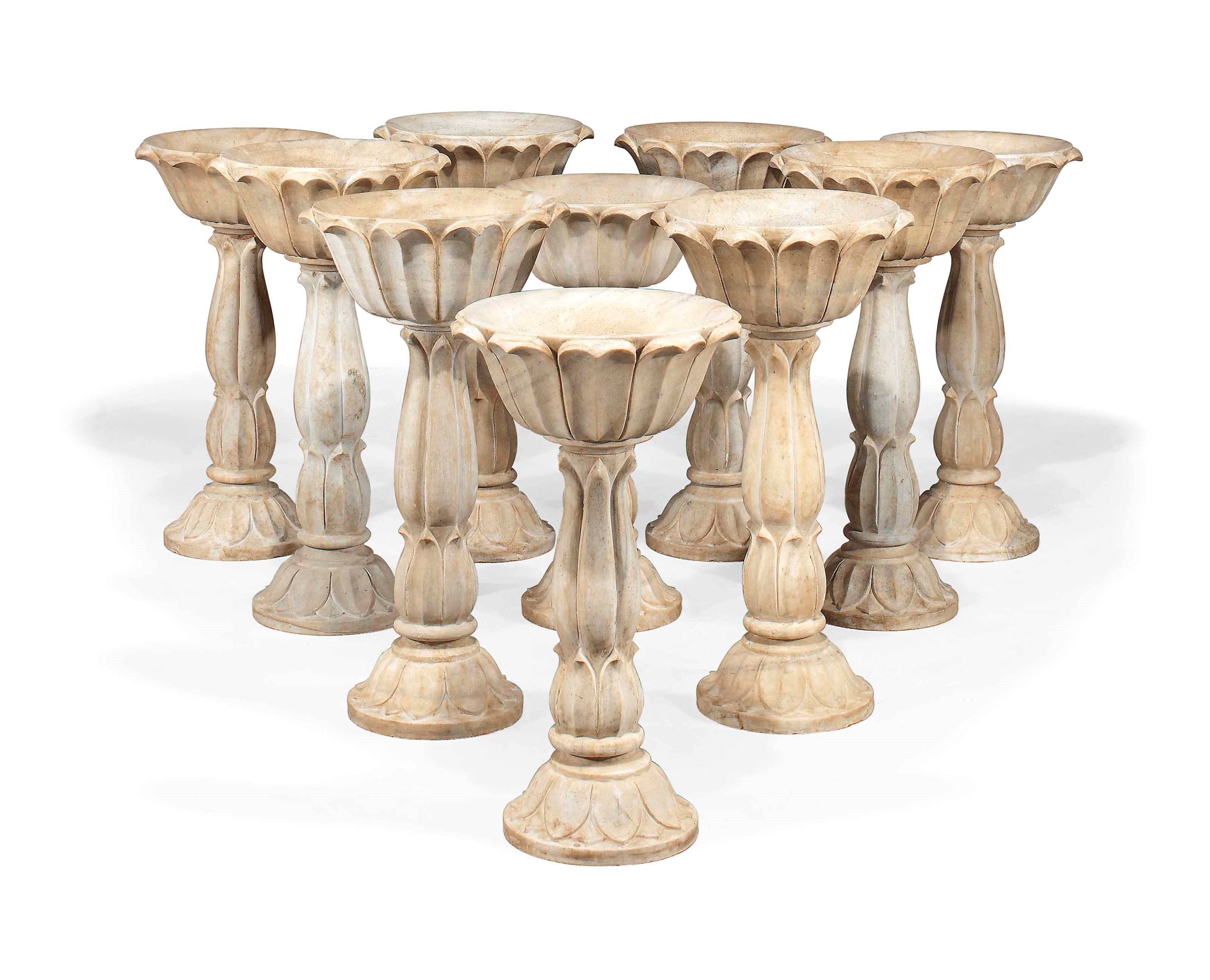 A GROUP OF TEN INDIAN MARBLE TAZZA ON STANDS