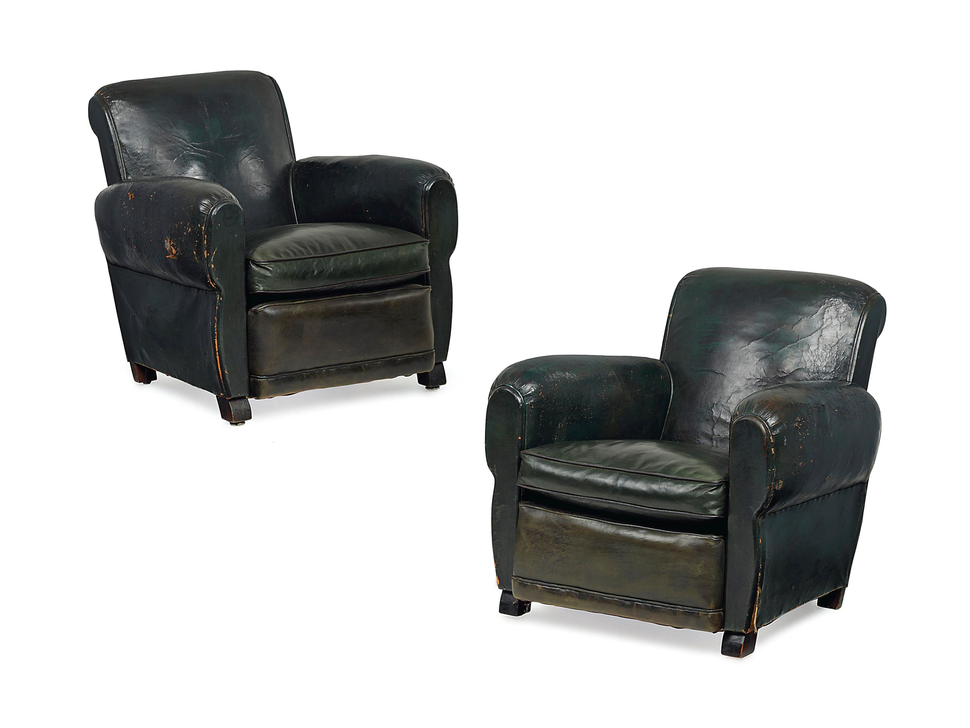 A PAIR OF FRENCH GREEN LEATHER AND MAHOGANY CLUB ARMCHAIRS