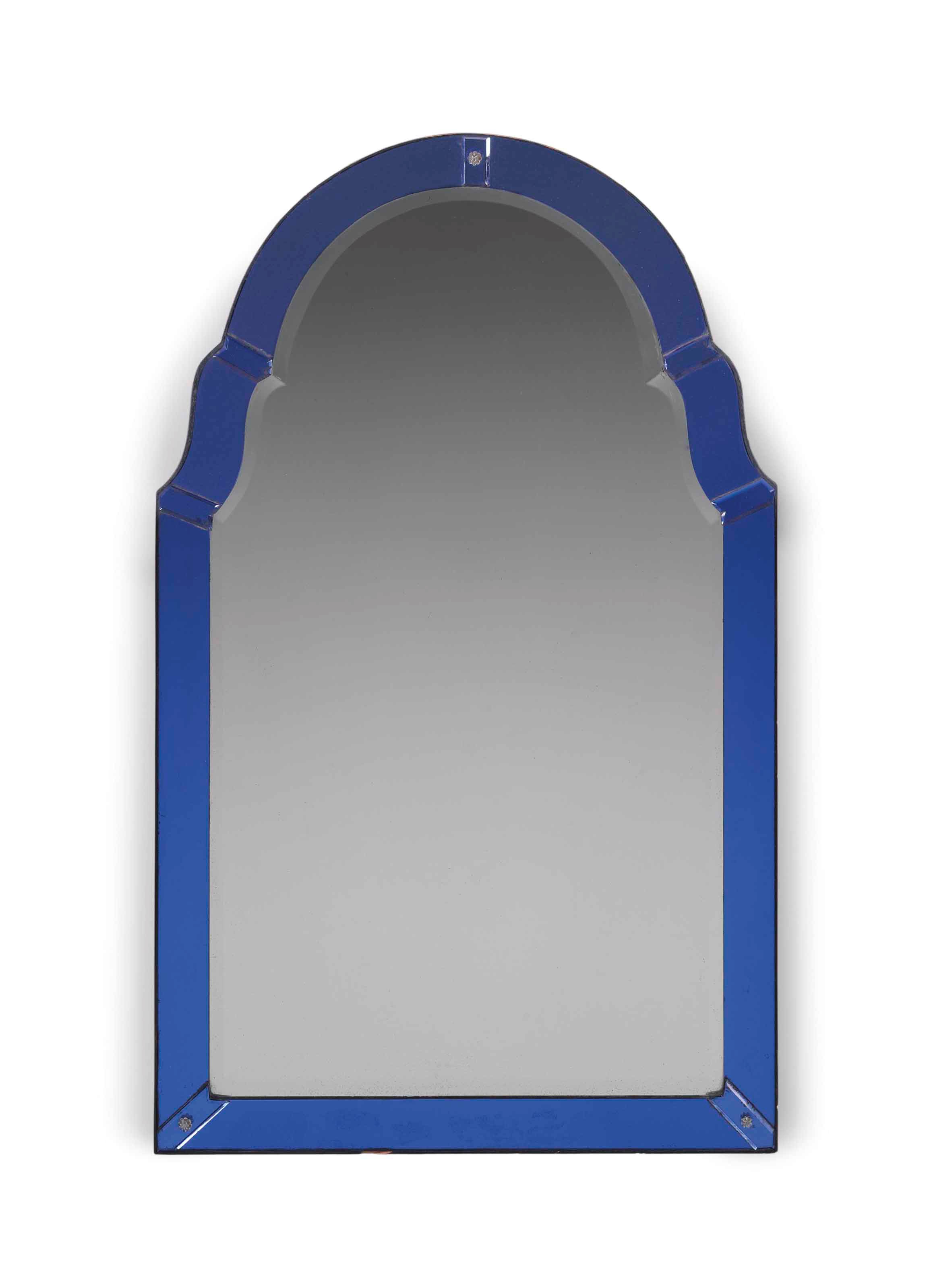 AN ITALIAN BLUE GLASS FRAMED MIRROR