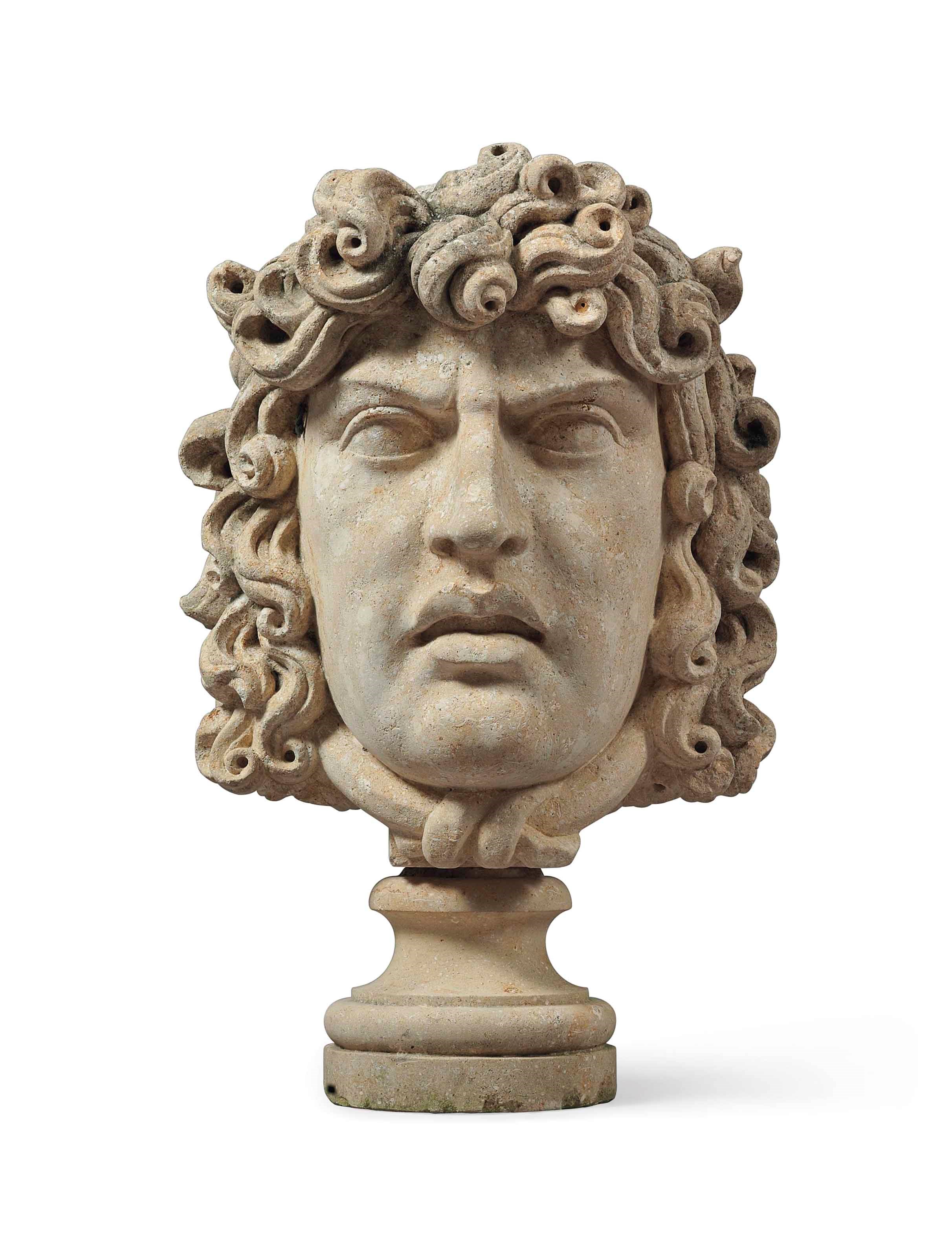 AN ITALIAN COMPOSITION STONE HEAD