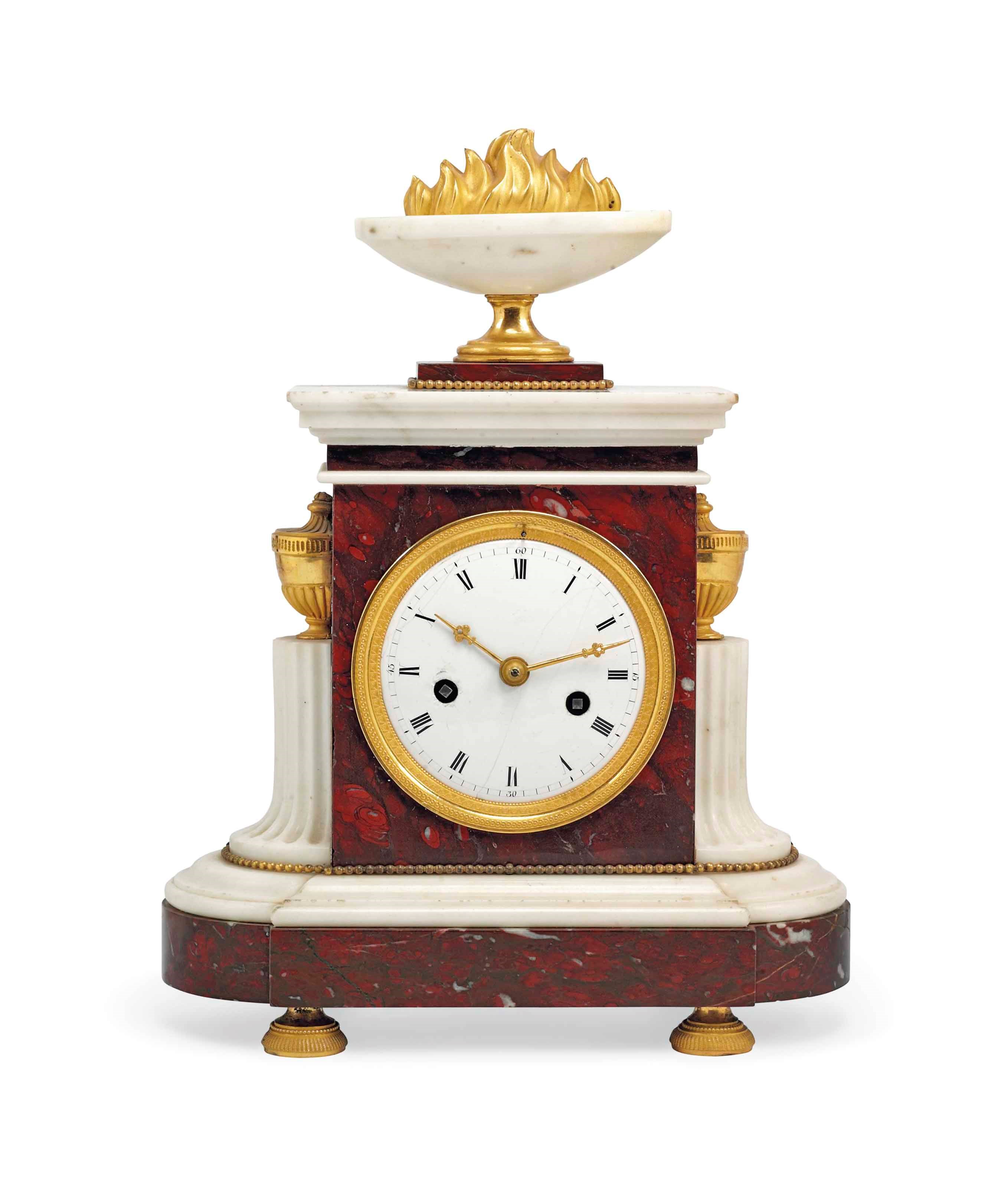 A LOUIS XVI ORMOLU-MOUNTED MARBLE STRIKING MANTEL CLOCK