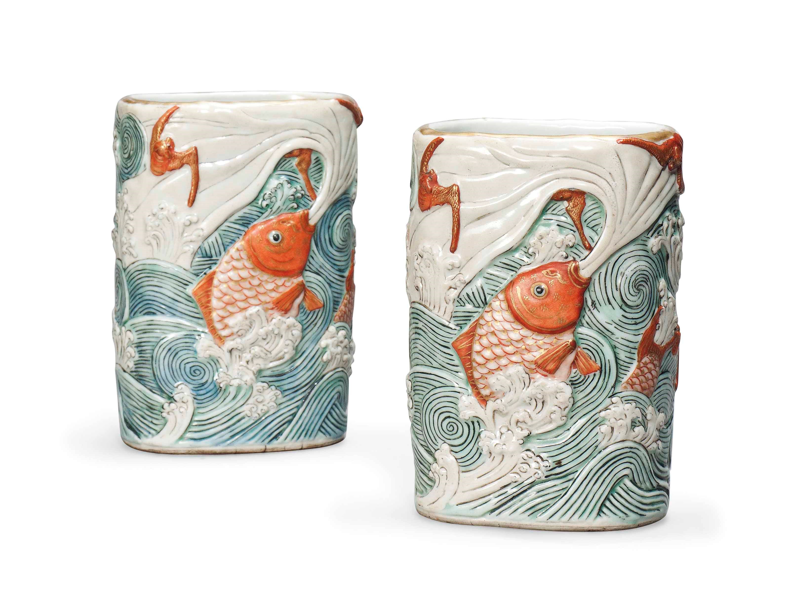 A PAIR OF CHINESE FAMILLE ROSE MOULDED VASES