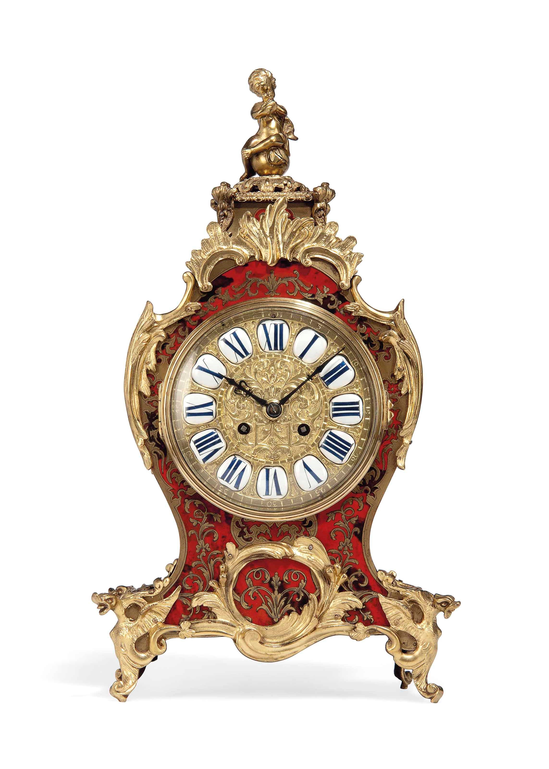 A LOUIS XV STYLE ORMOLU-MOUNTED AND BRASS-INLAID FAUX TORTOISESHELL 'BOULLE' STRIKING MANTEL CLOCK