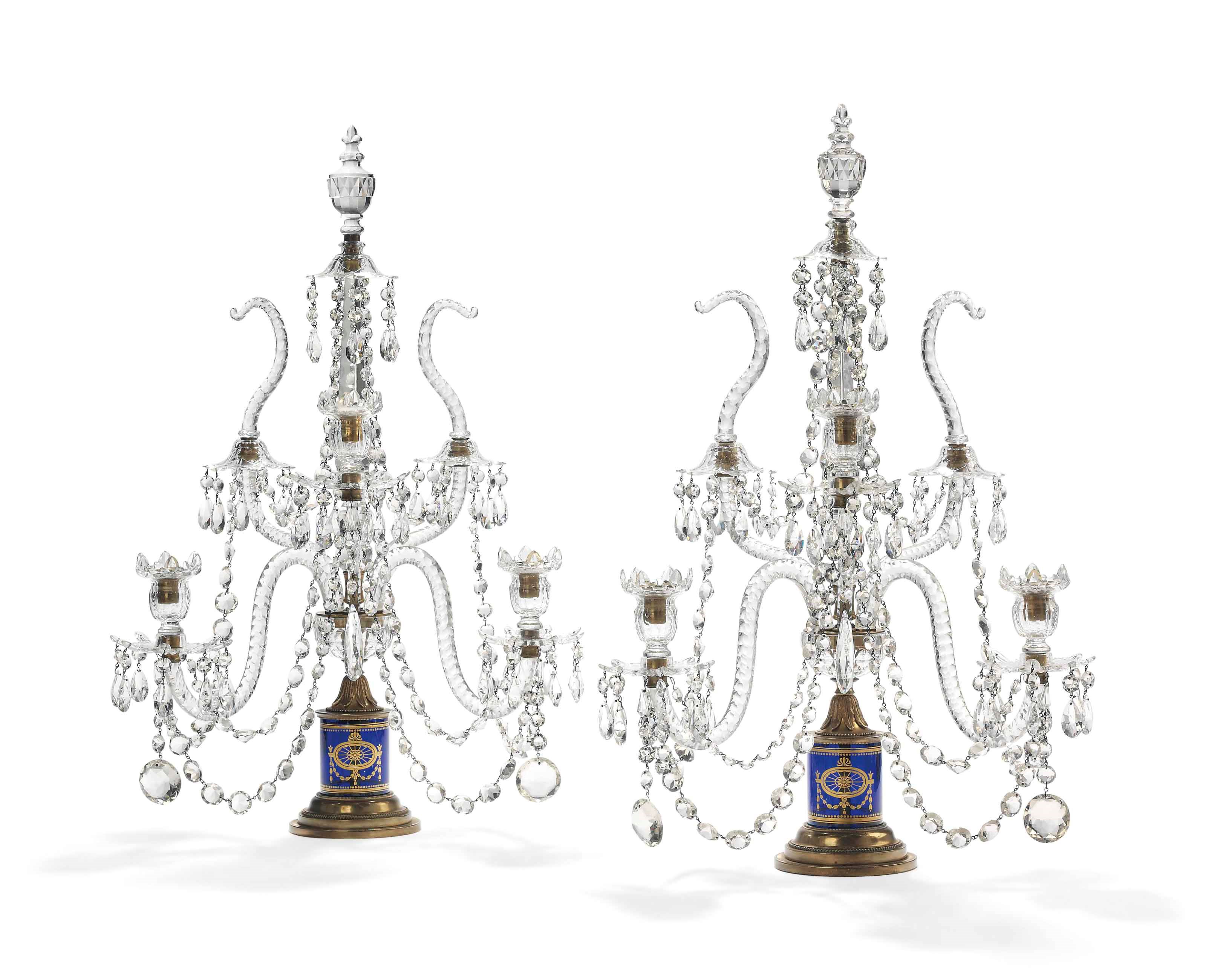 A PAIR OF GEORGE III ORMOLU, CUT-GLASS AND BLUE-GLASS THREE-LIGHT CANDELABRA