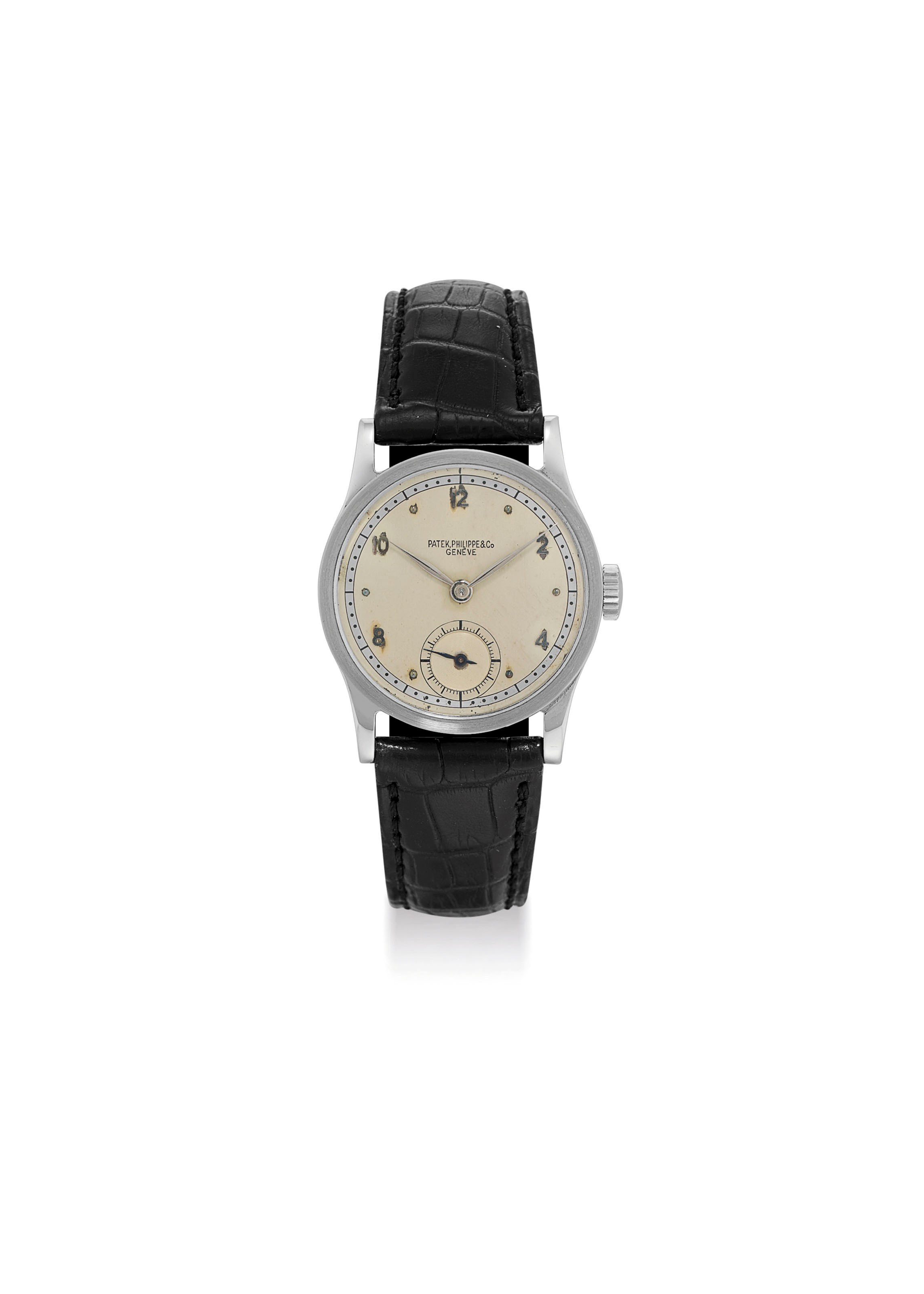 PATEK PHILIPPE. A STAINLESS STEEL WRISTWATCH WITH TWO-TONE SILVERED DIAL