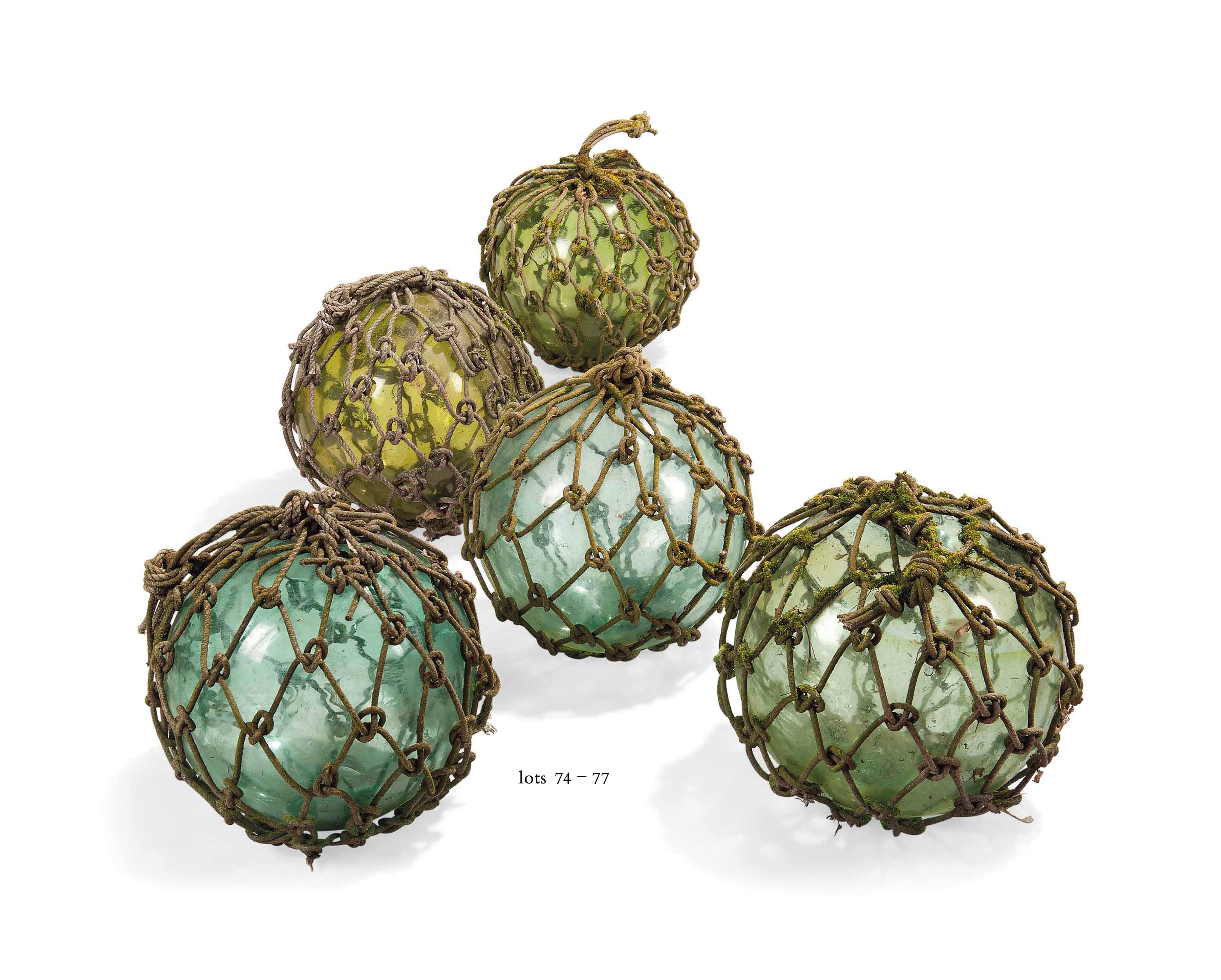 A QUANTITY OF KOREAN GREEN GLASS AND ROPE BOUND FISHERMAN'S