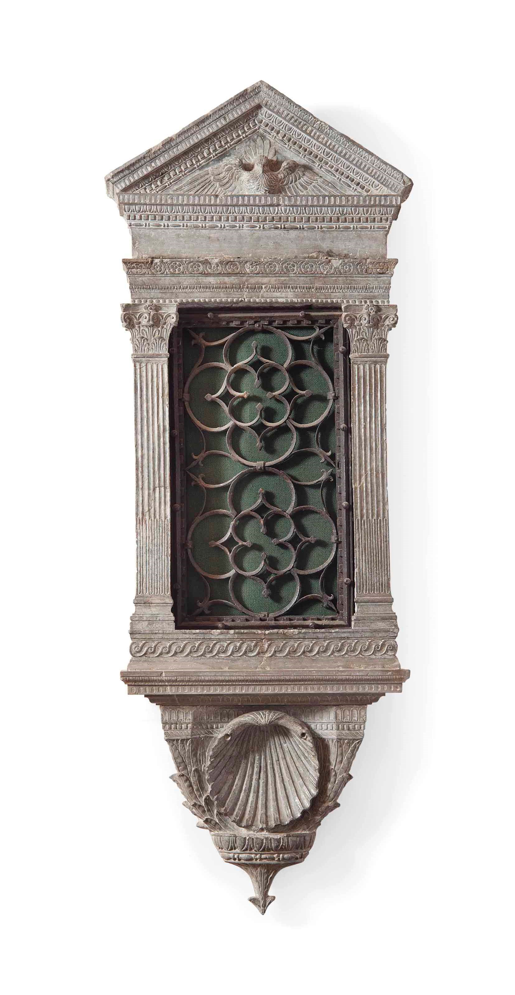 A CARVED MARBLE ARCHITECTURAL FRAME