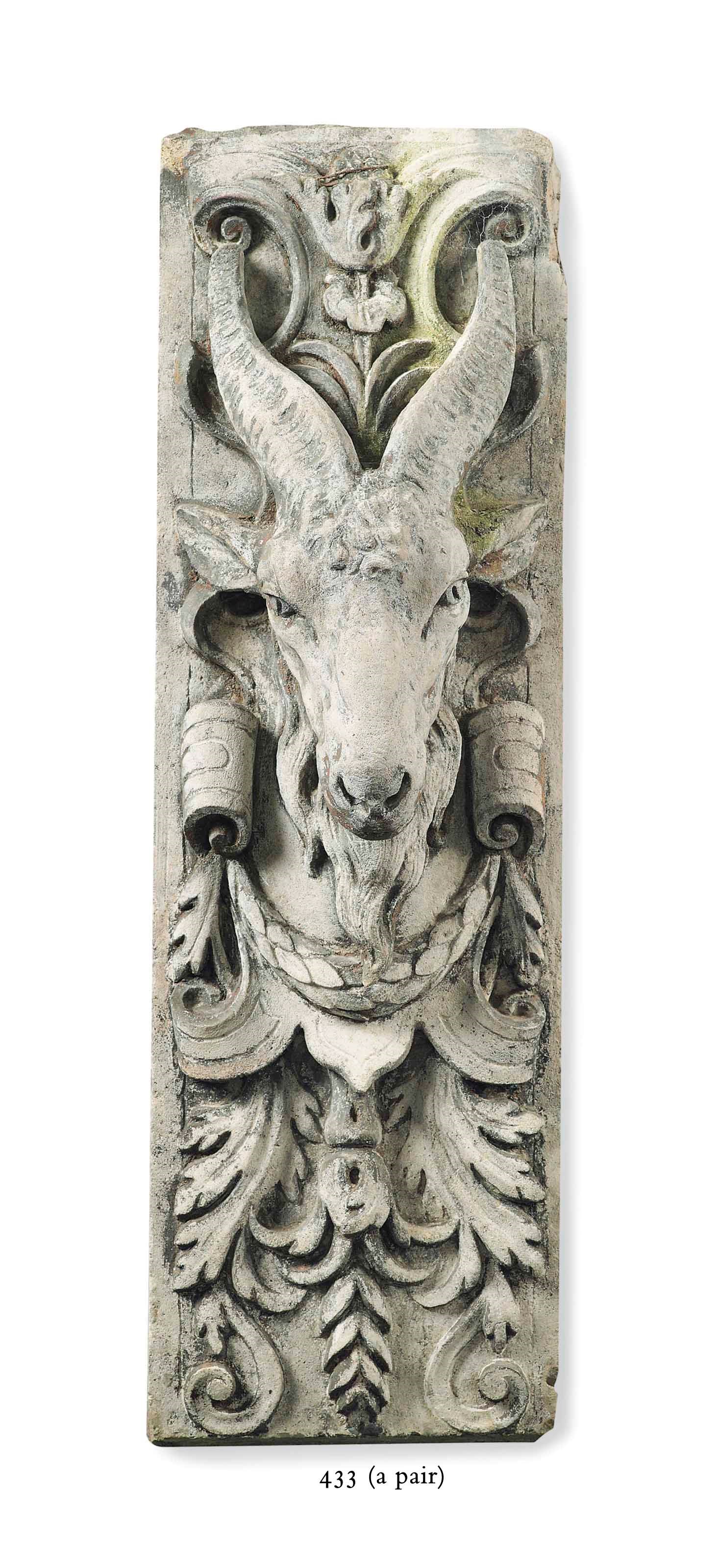 A PAIR OF CARVED STONE RELIEF PANELS