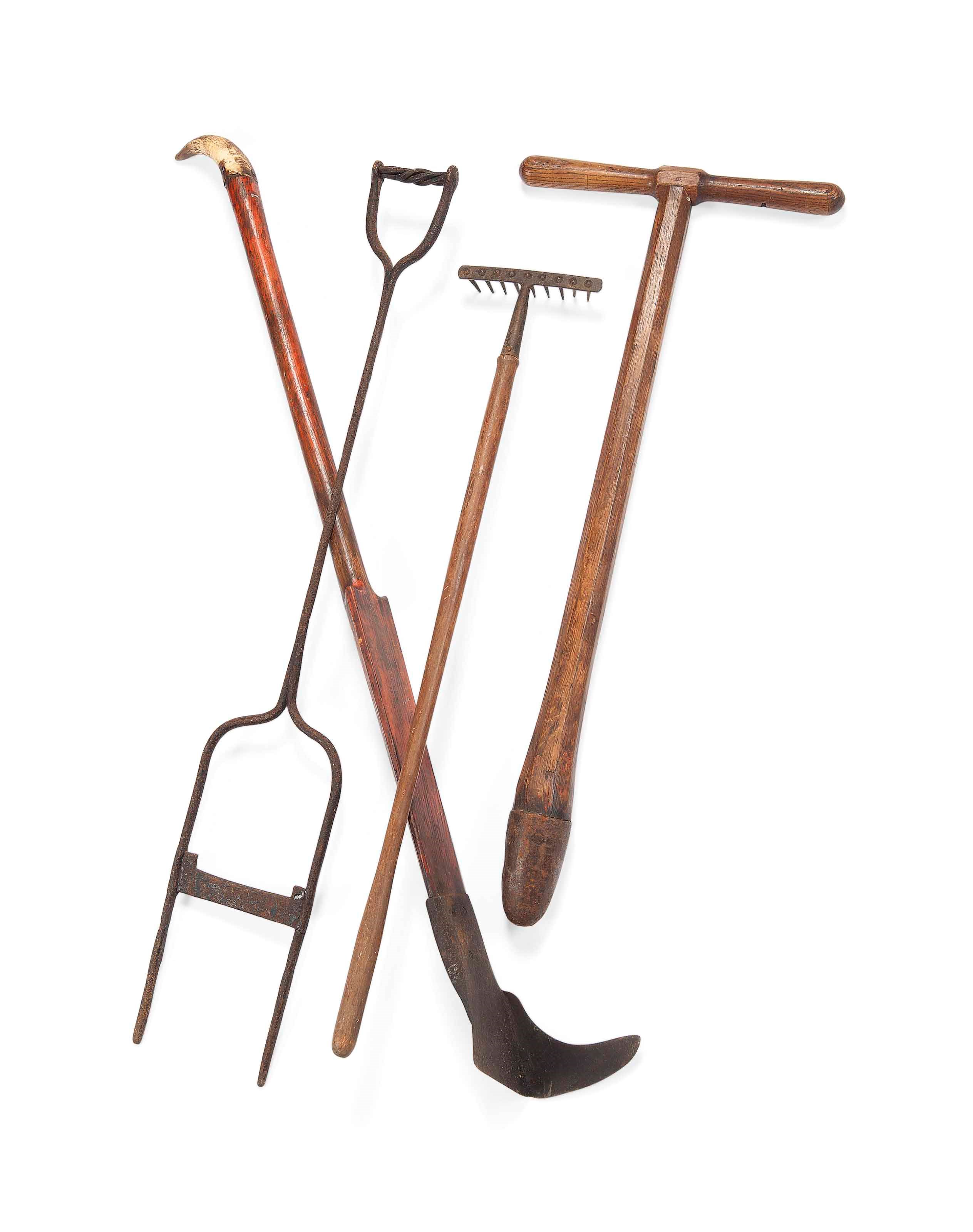 A RED-PAINTED PINE AND WROUGHT-IRON PEAT-CUTTER