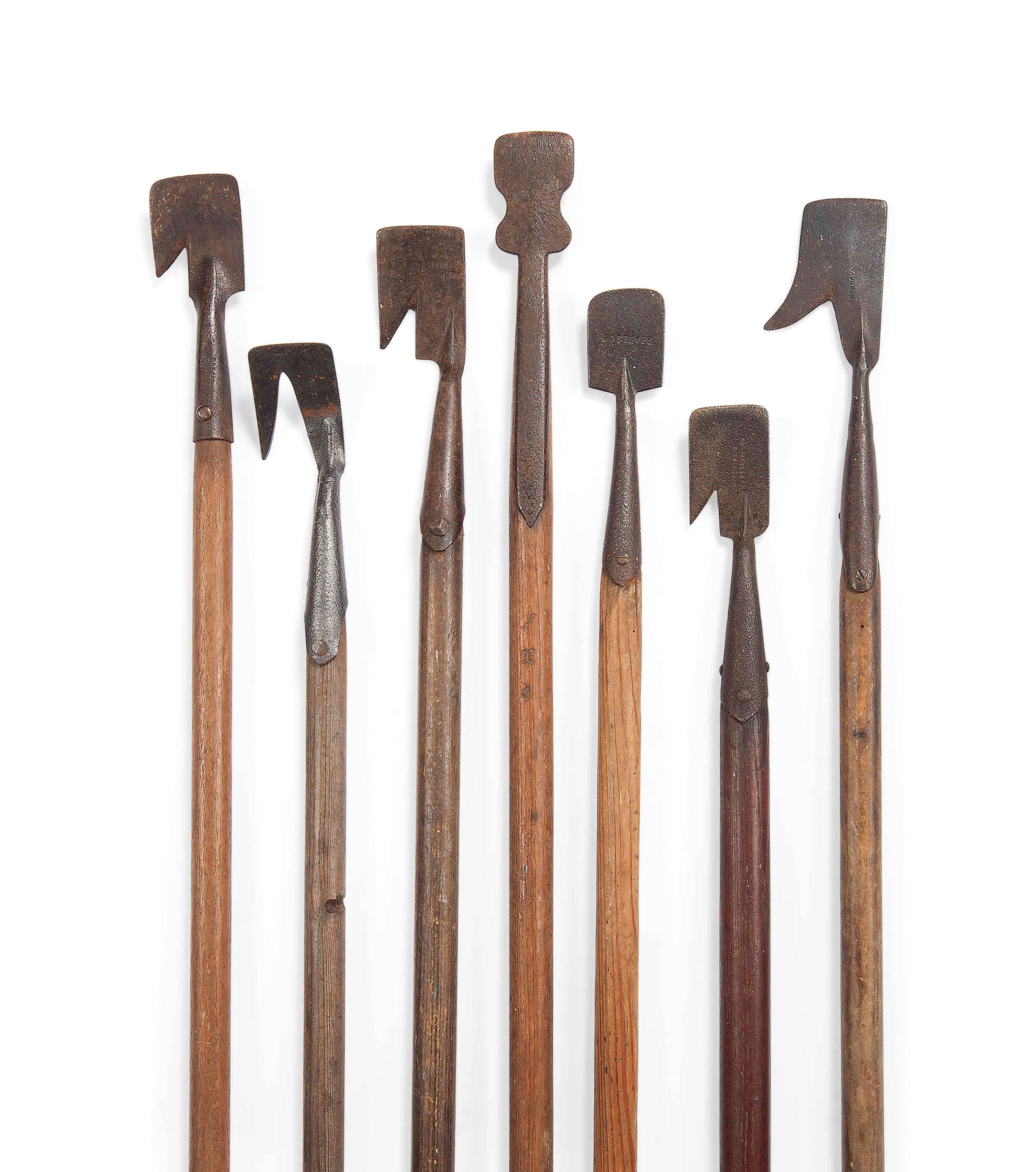 SEVEN WROUGHT-IRON WOODEN-HANDLED WEED-HOOKS AND 'SPUDS'