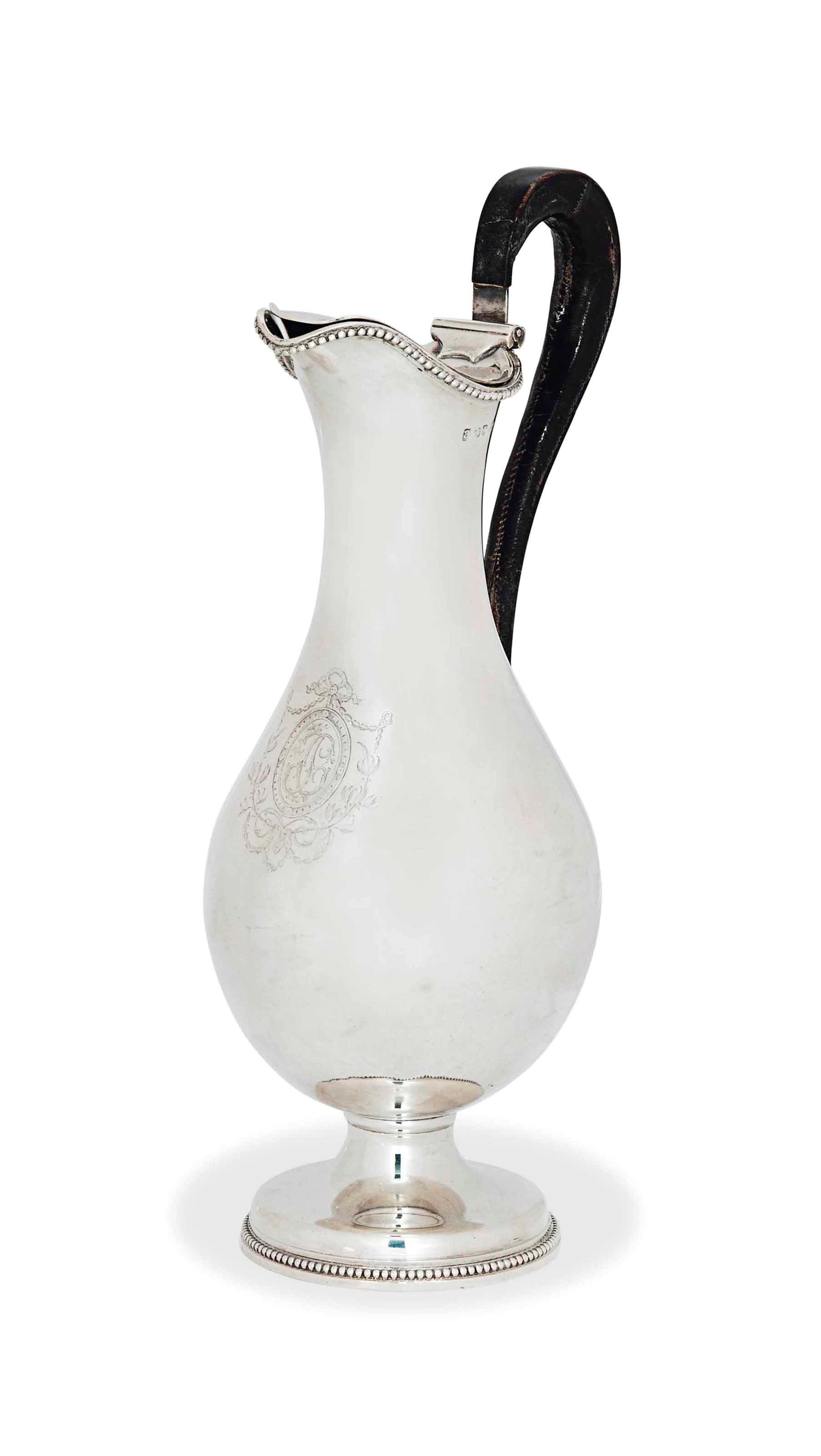 A GEORGE III SILVER EWER