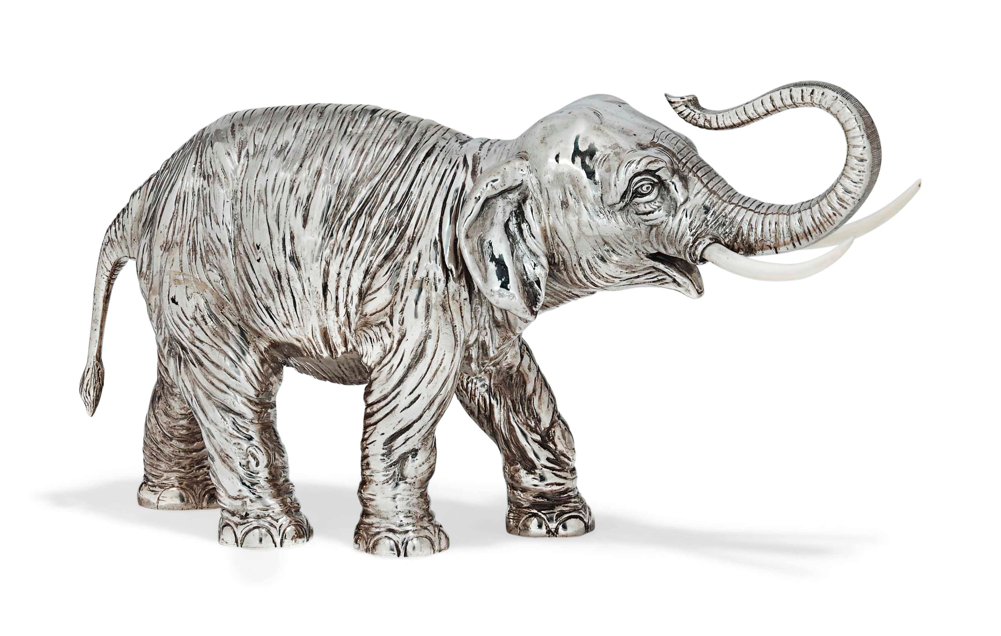 A CONTINENTAL METALWARE ELEPHANT TABLE ORNAMENT