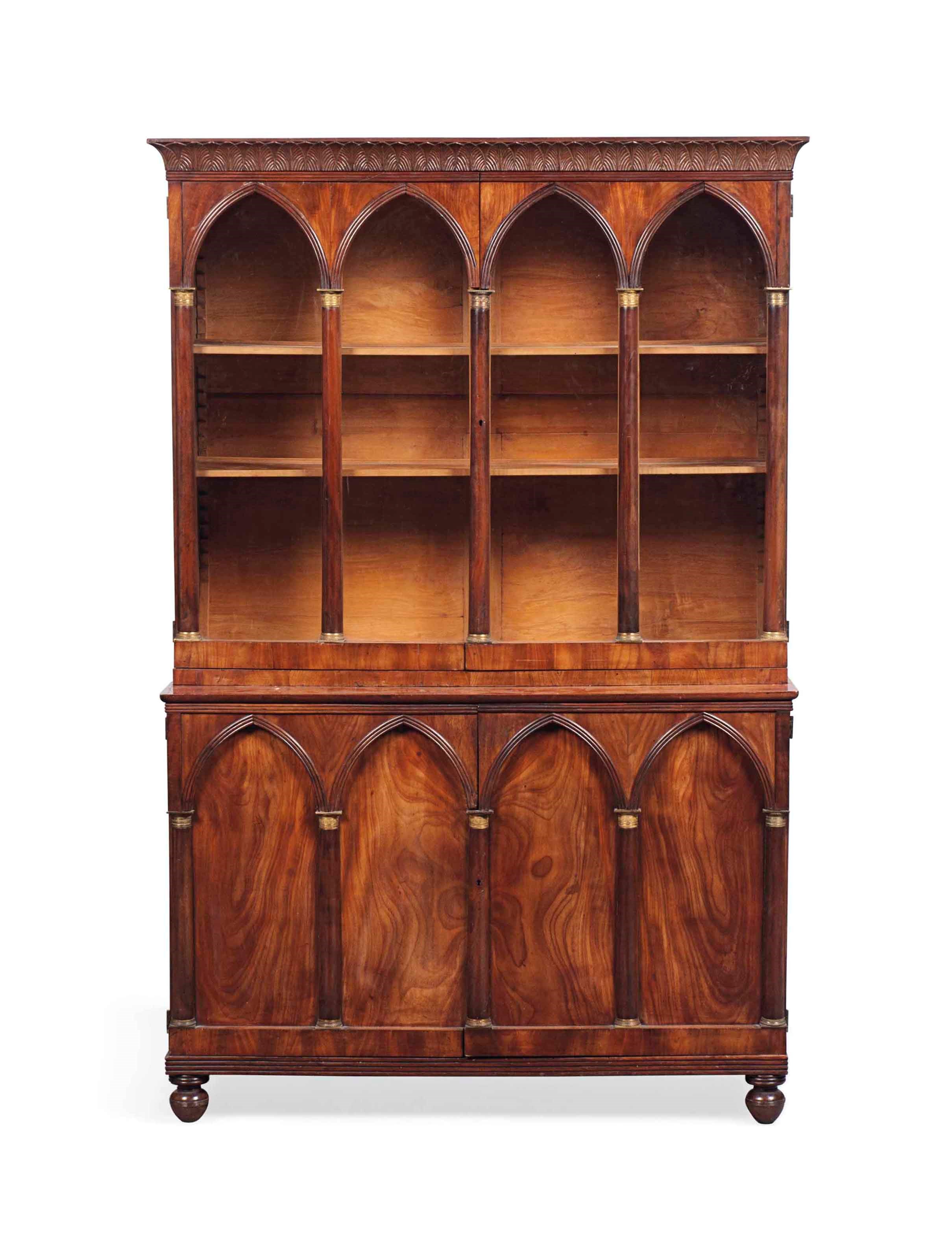 A SMALL LOUIS PHILIPPE GILT-METAL MOUNTED FIGURED WALNUT BOOKCASE