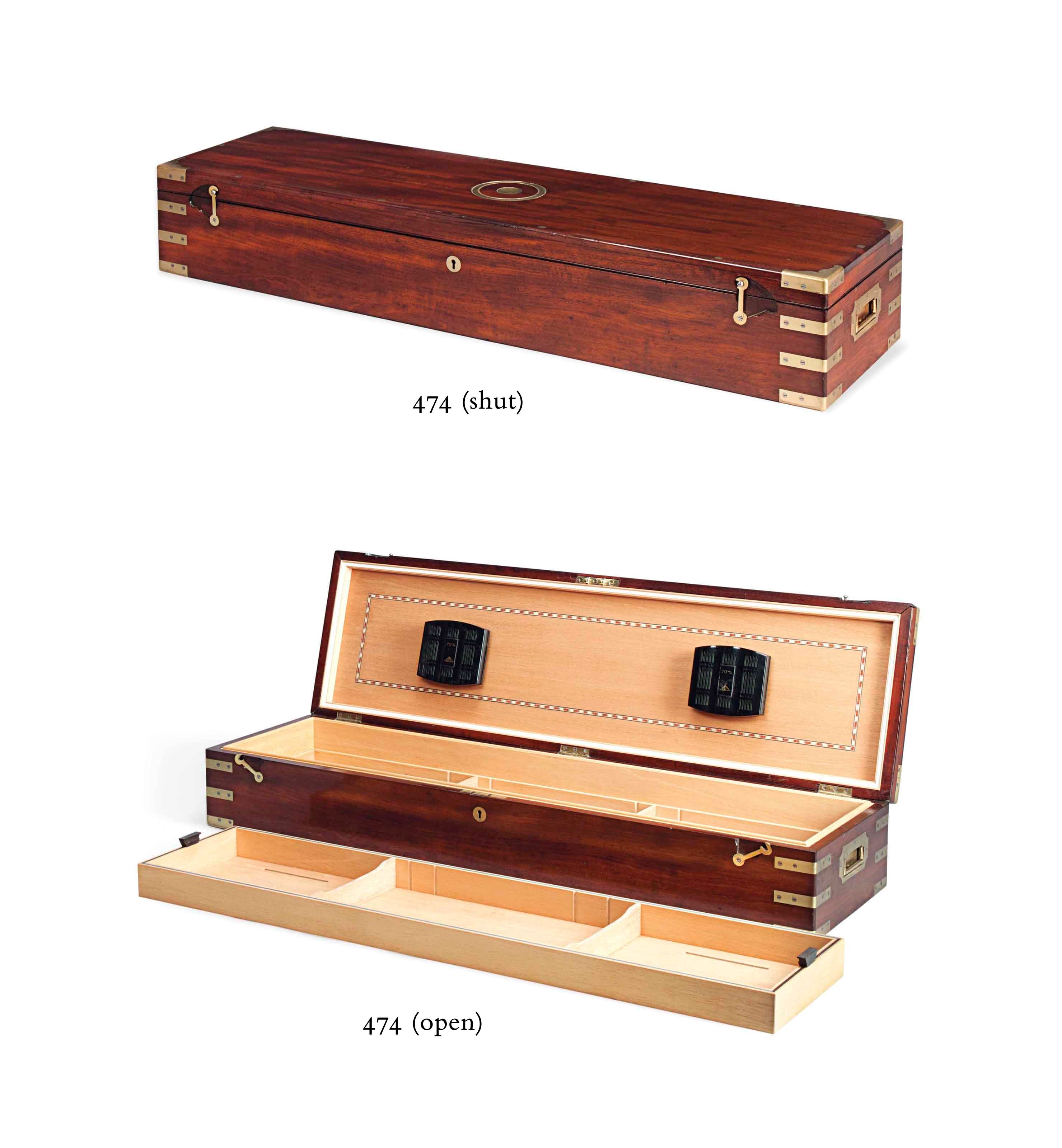A NOVELTY HUMIDOR CONVERTED FROM A VICTORIAN MAHOGANY GUN CASE