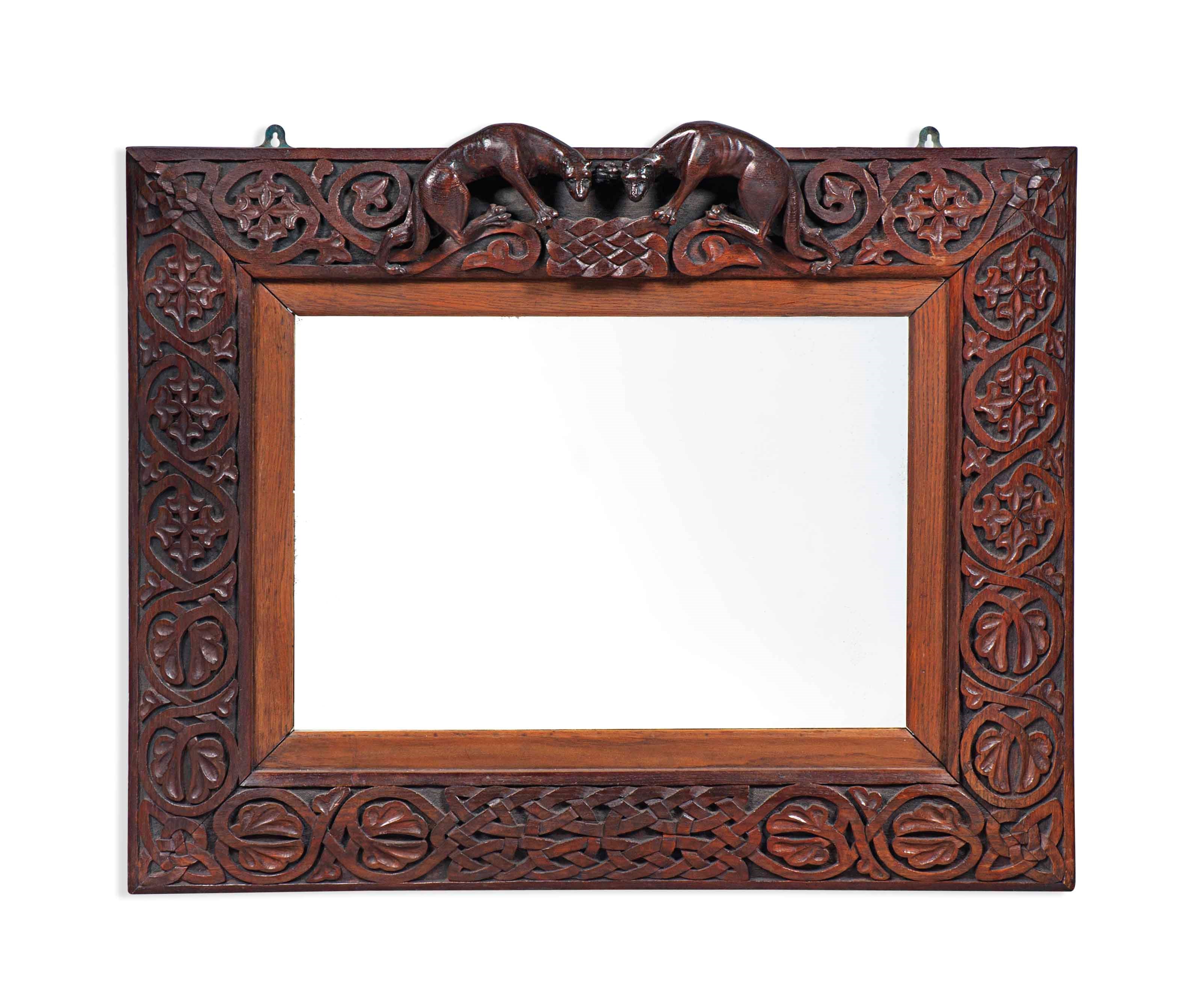 A CARVED OAK MIRROR, POSSIBLY IRISH