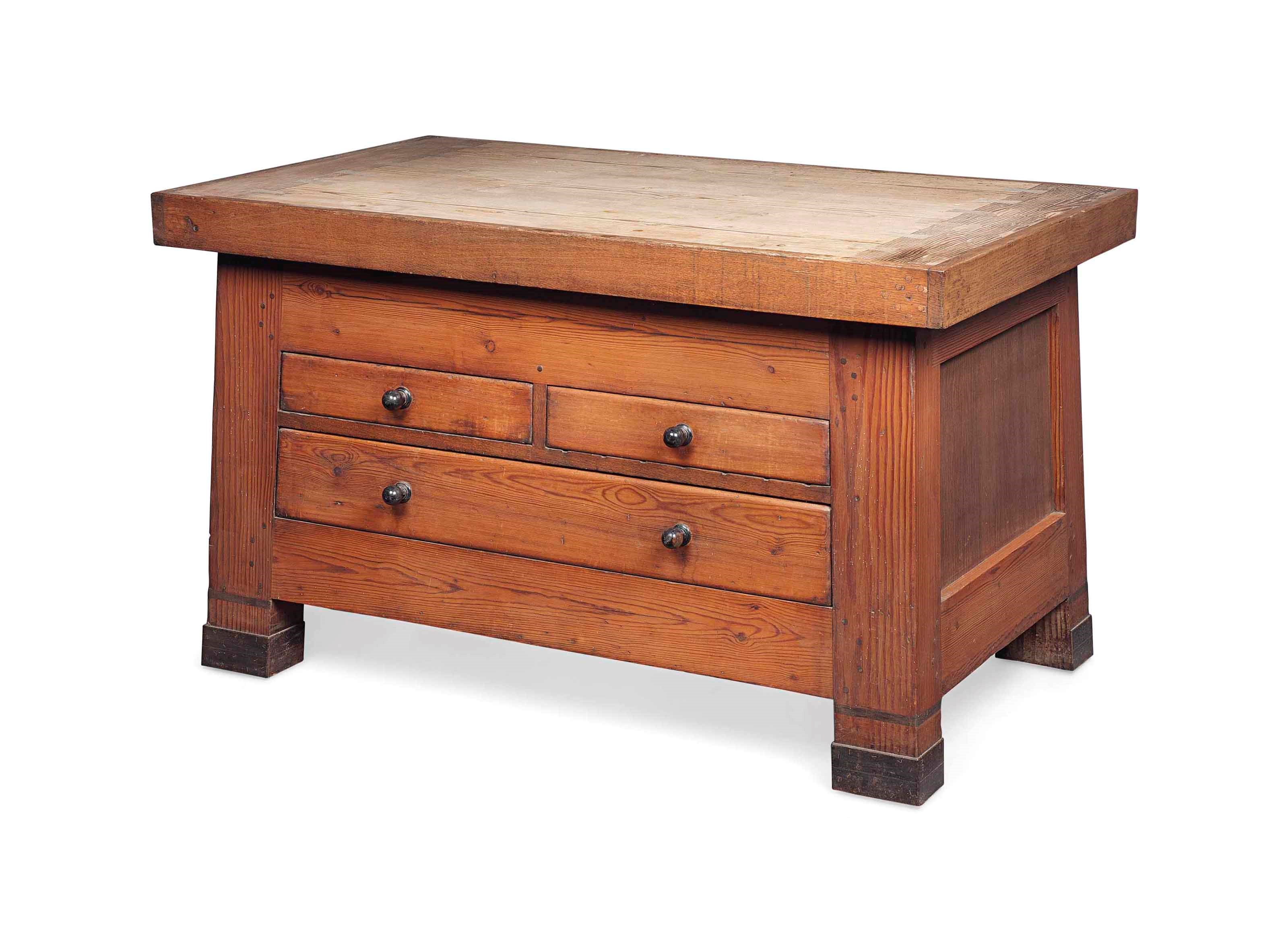 A COTSWOLD SCHOOL PINE AND OAK BUTCHER'S BLOCK