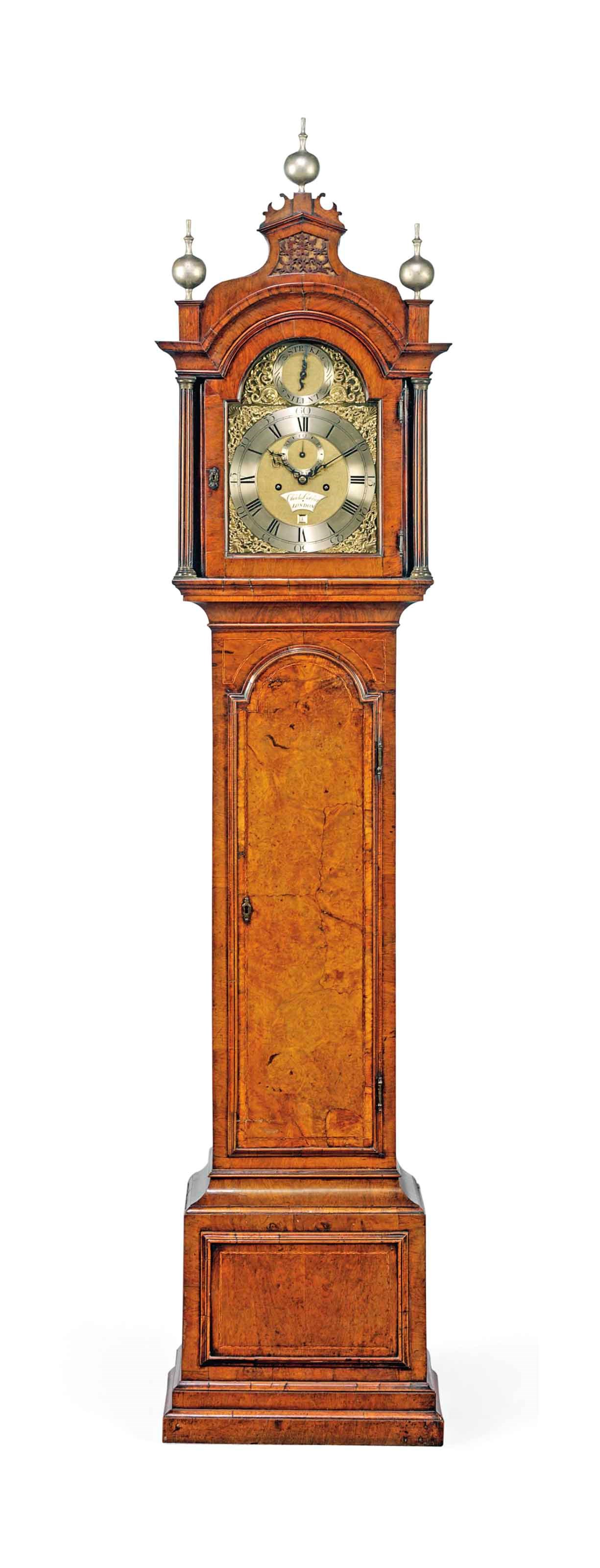 A GEORGE III BURR WALNUT AND WALNUT STRIKING LONGCASE CLOCK