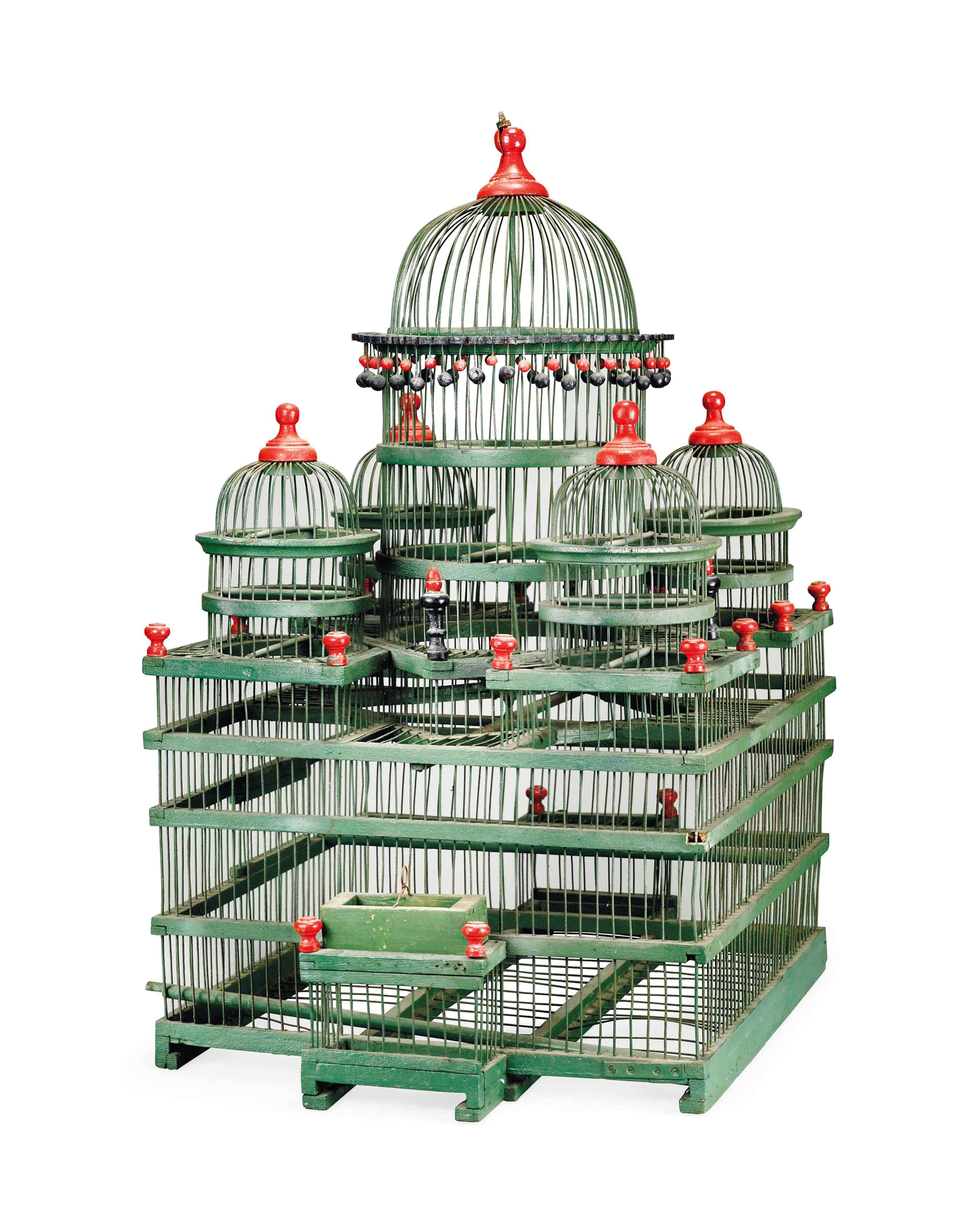 A POLYCHROME DECORATED BIRD CAGE