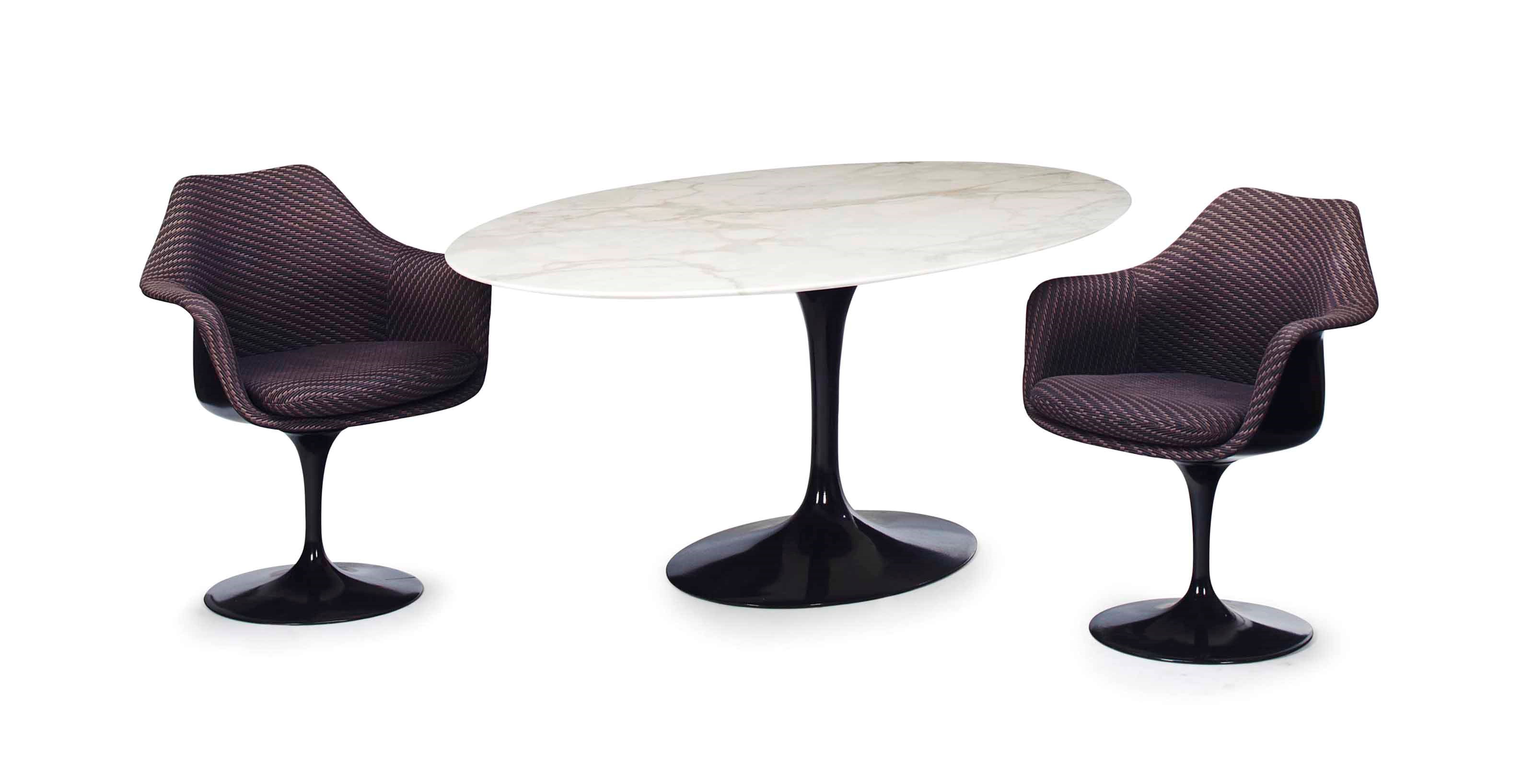 A 'TULIP' DINING TABLE,