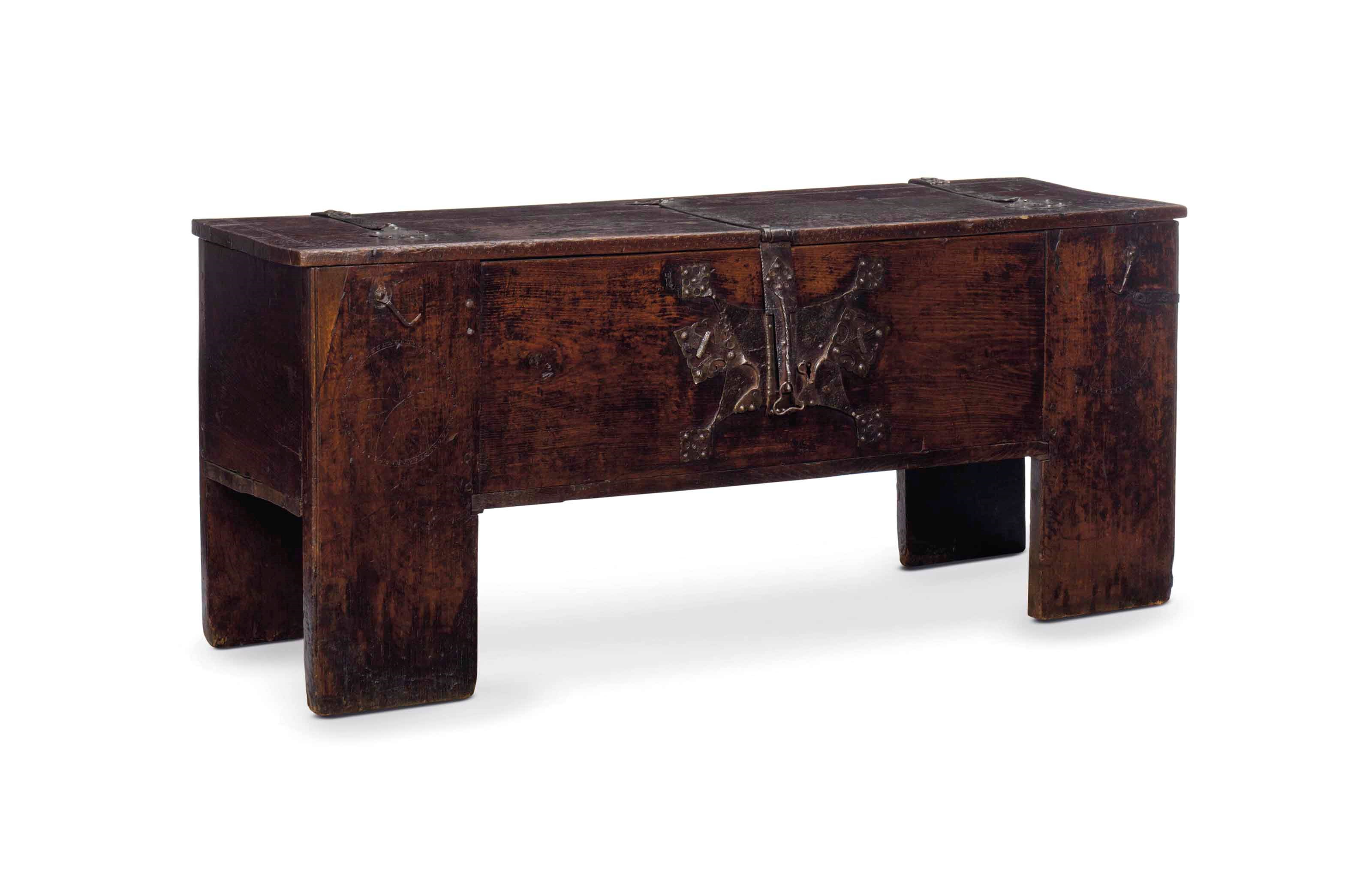 A GERMAN WROUGHT-IRON MOUNTED OAK COFFER,