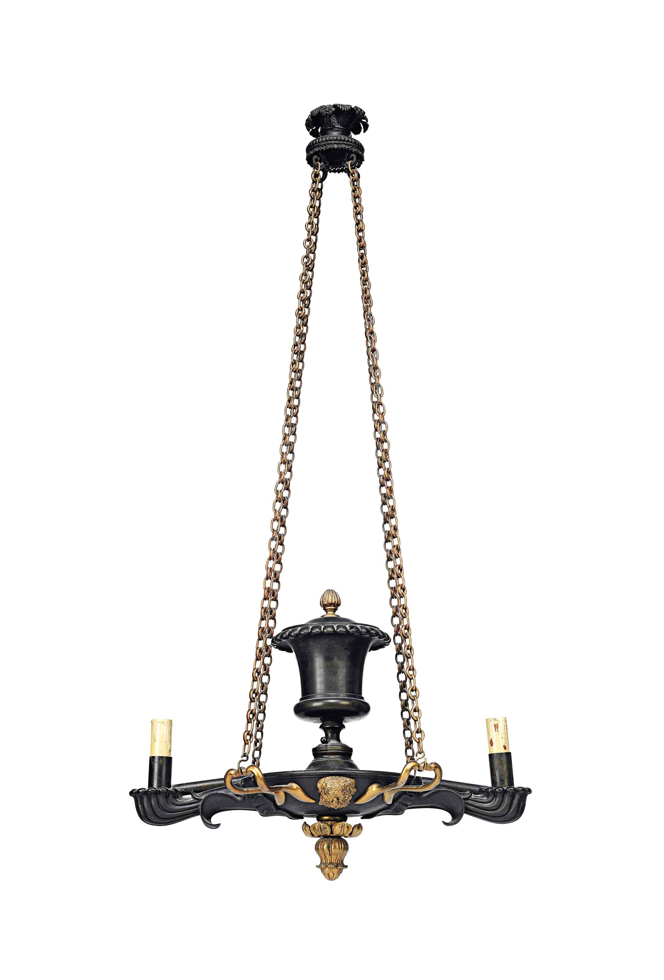 A REGENCY BRONZE AND GILT-BRONZE COLZA LIGHT