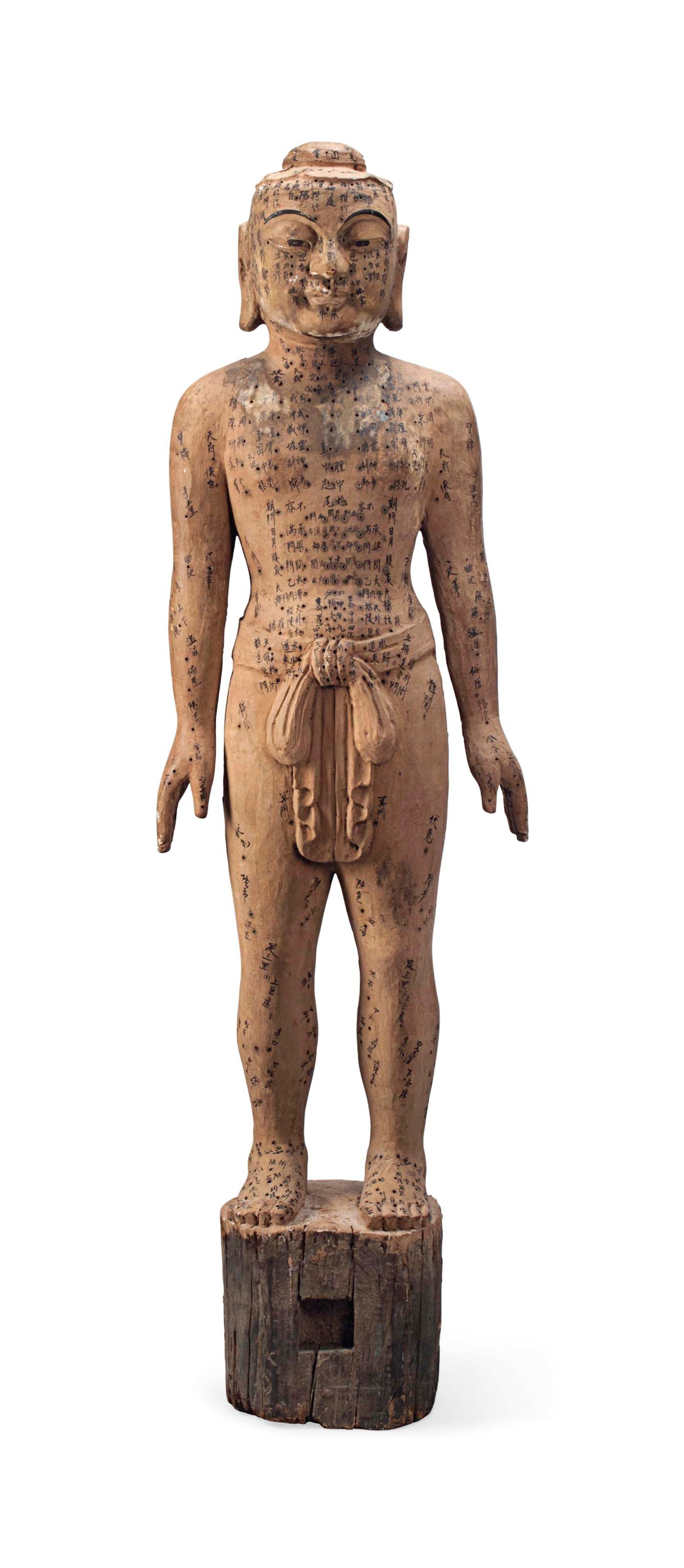 A CHINESE POLYCHROME WOOD TEACHING ACUPUNCTURE MODEL