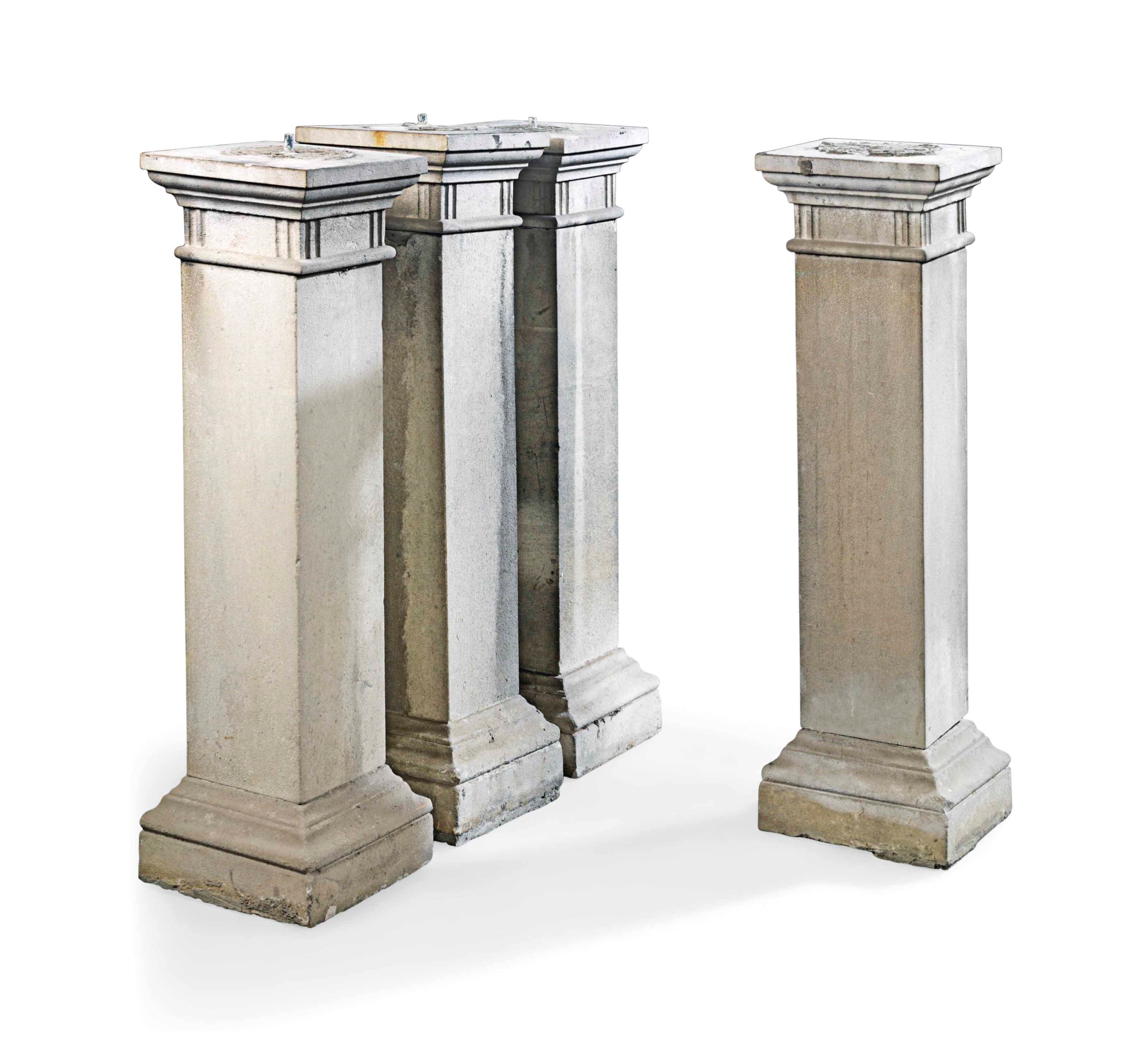A SET OF FOUR LIMESTONE PEDESTALS