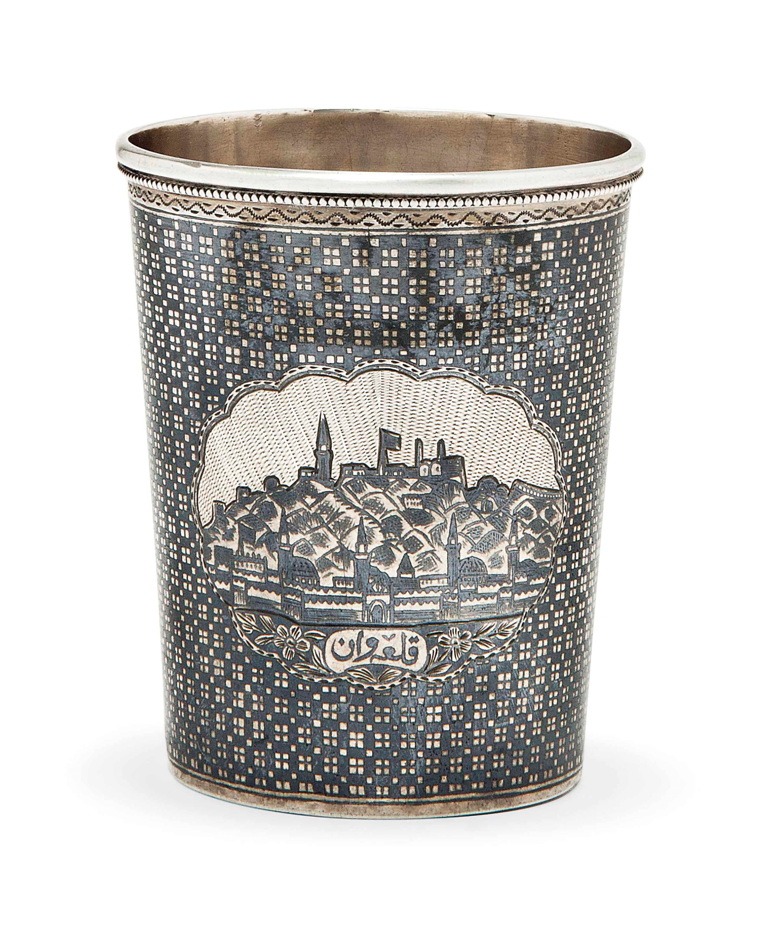 A FINE VAN NIELLOED SILVER BEAKER