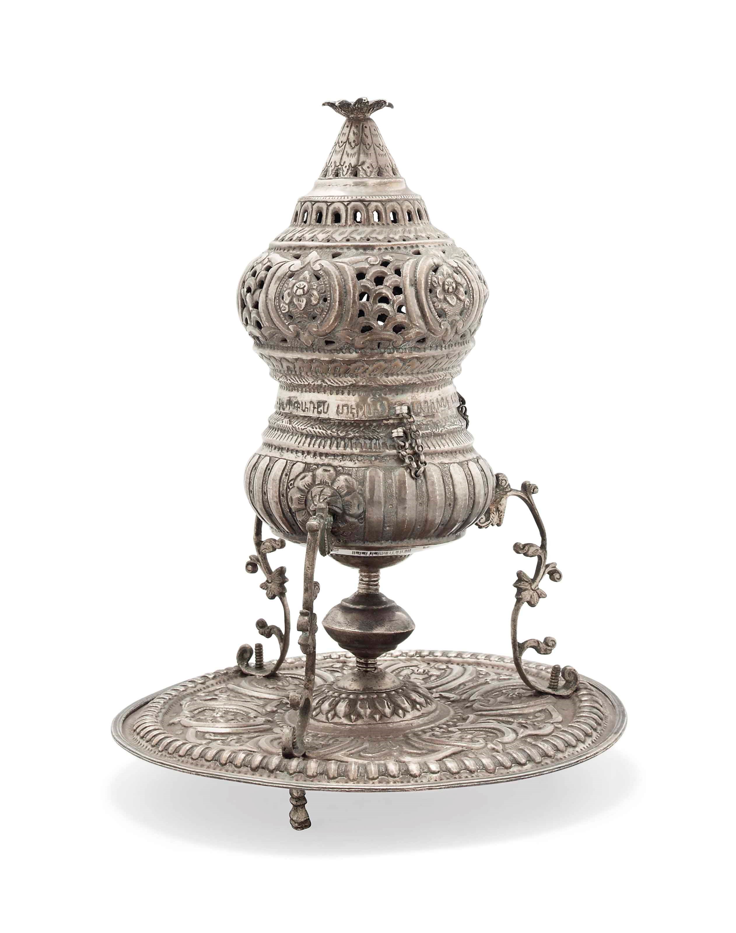 A SILVER INCENSE BURNER