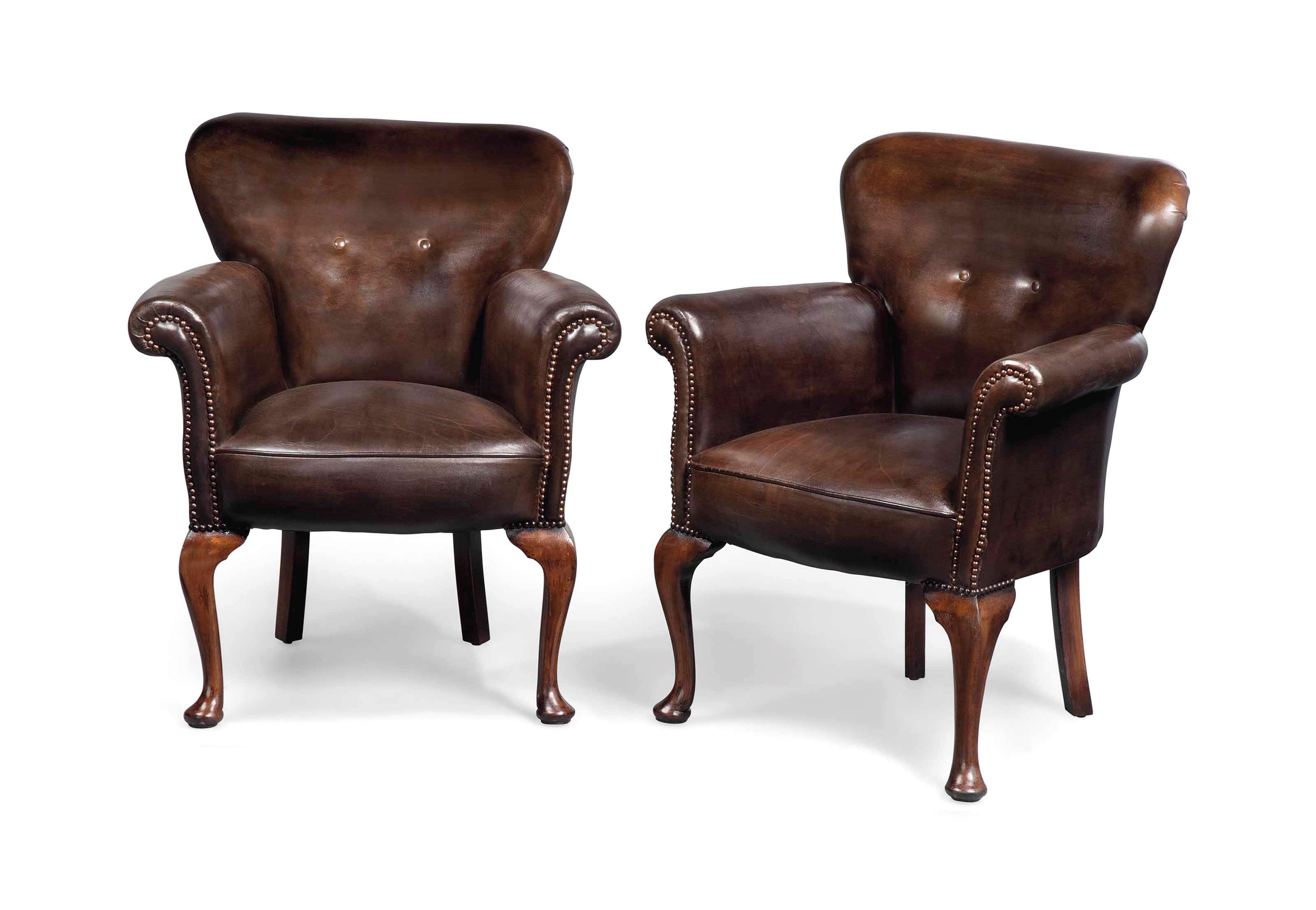 A PAIR OF BEECH LIBRARY TUB ARMCHAIRS