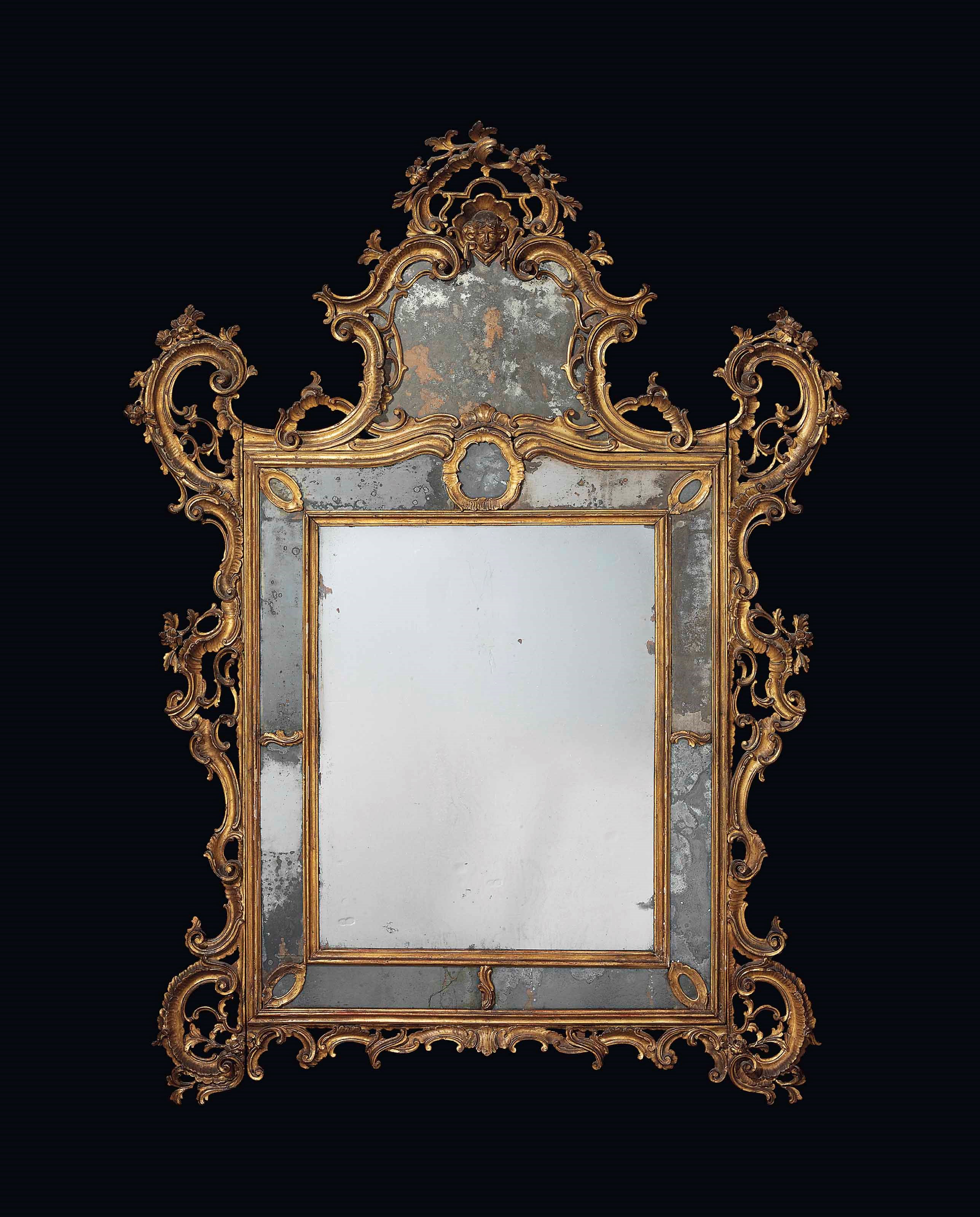 A NORTH ITALIAN GILTWOOD MIRROR