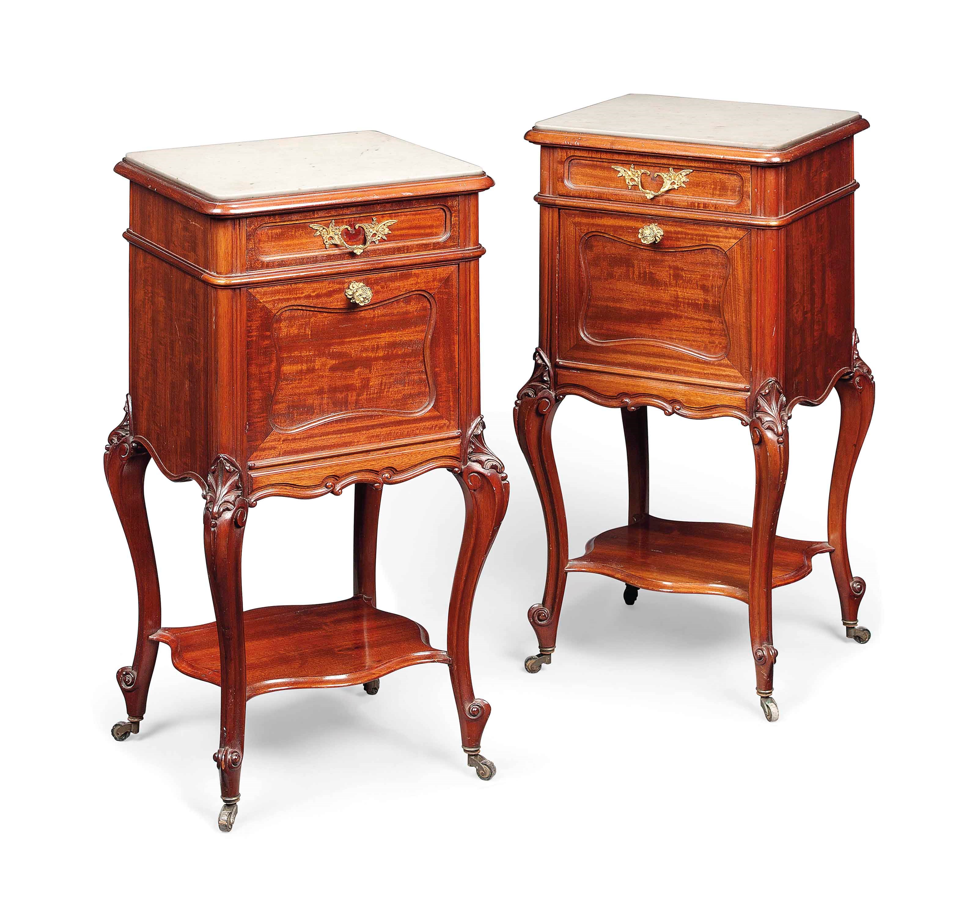 A PAIR OF FRENCH MAHOGANY BEDSIDE CABINETS