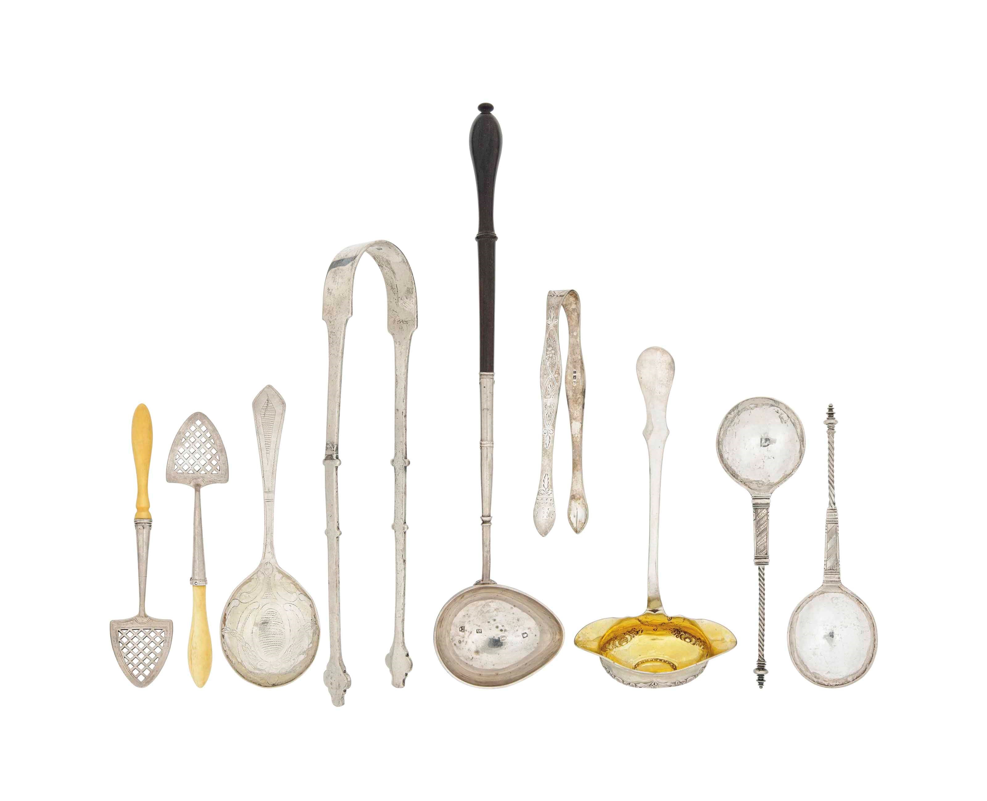 A PAIR OF GEORGE III SILVER BUTTER SPADES WITH IVORY HANDLES