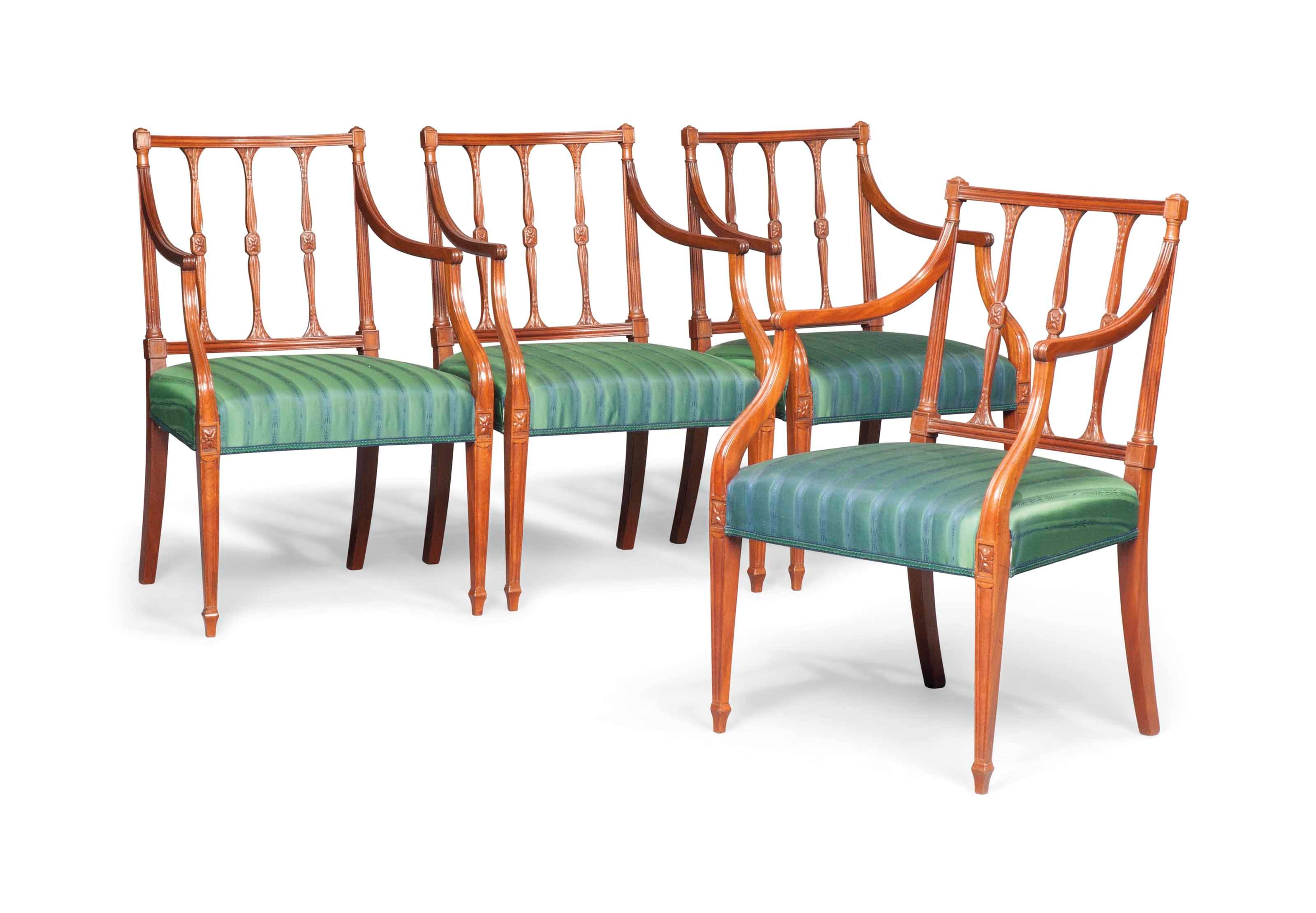 A SET OF FOUR GEORGE III MAHOGANY ARMCHAIRS