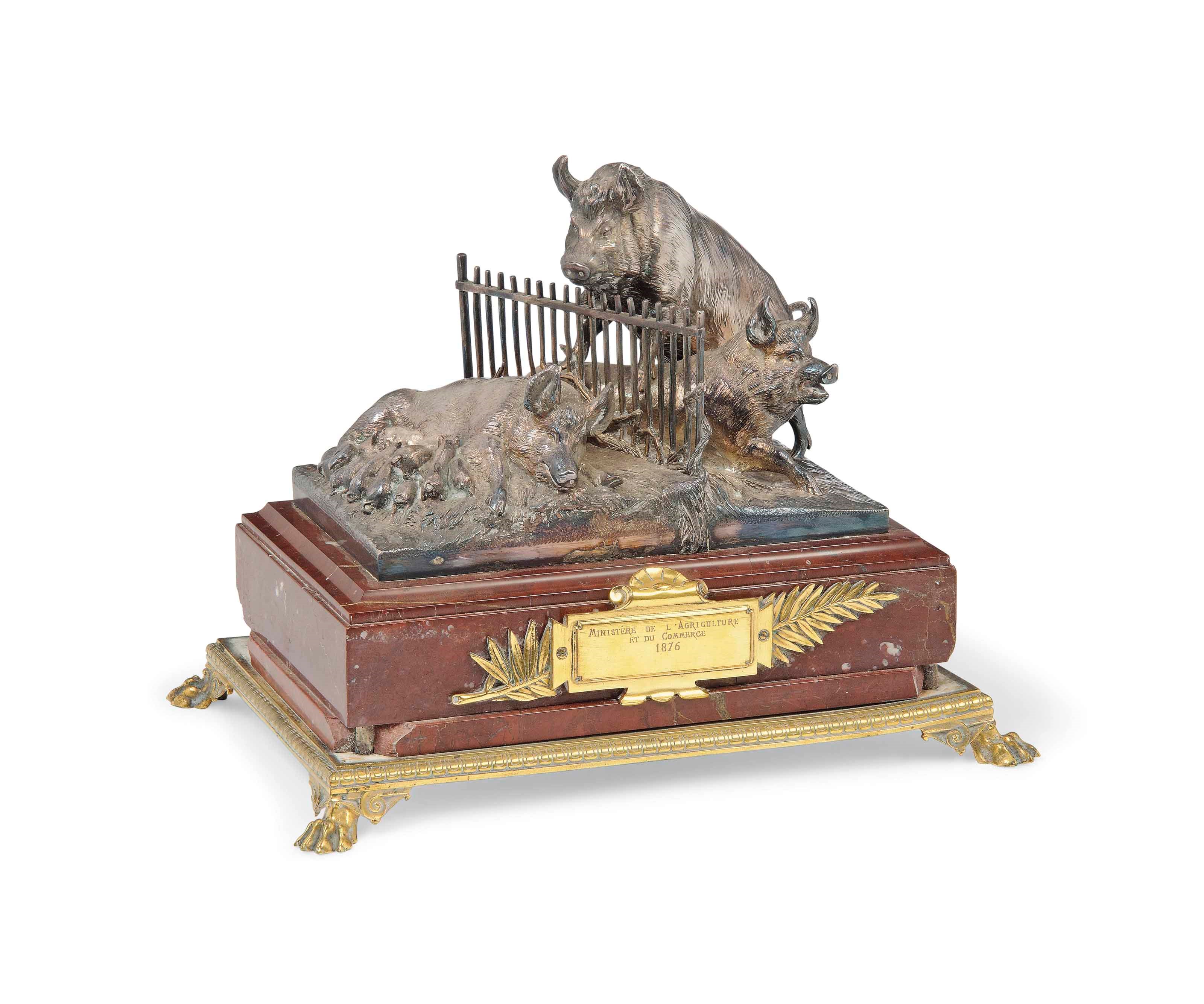 A SILVER-PATED BRONZE GROUP OF THREE PIGS