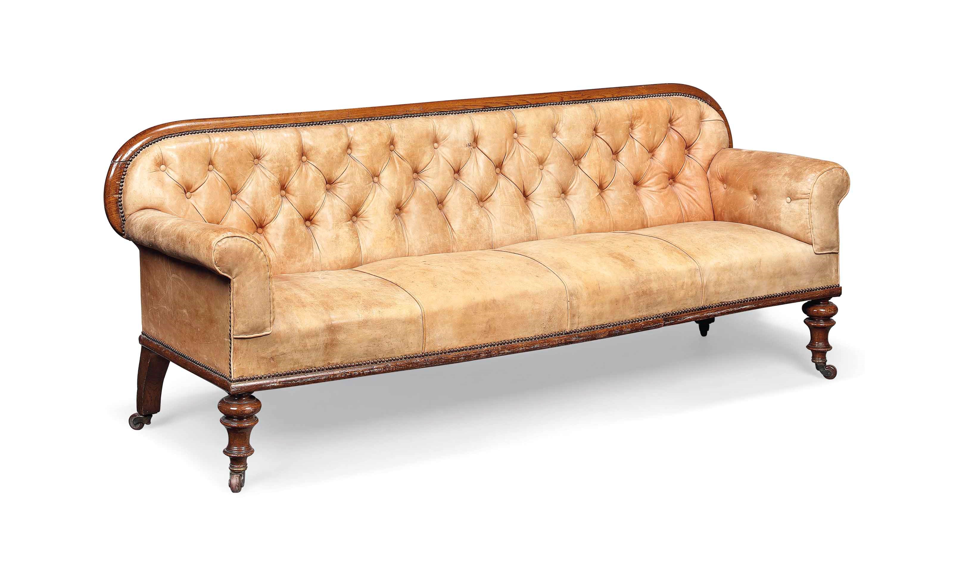 AN EARLY VICTORIAN OAK SOFA