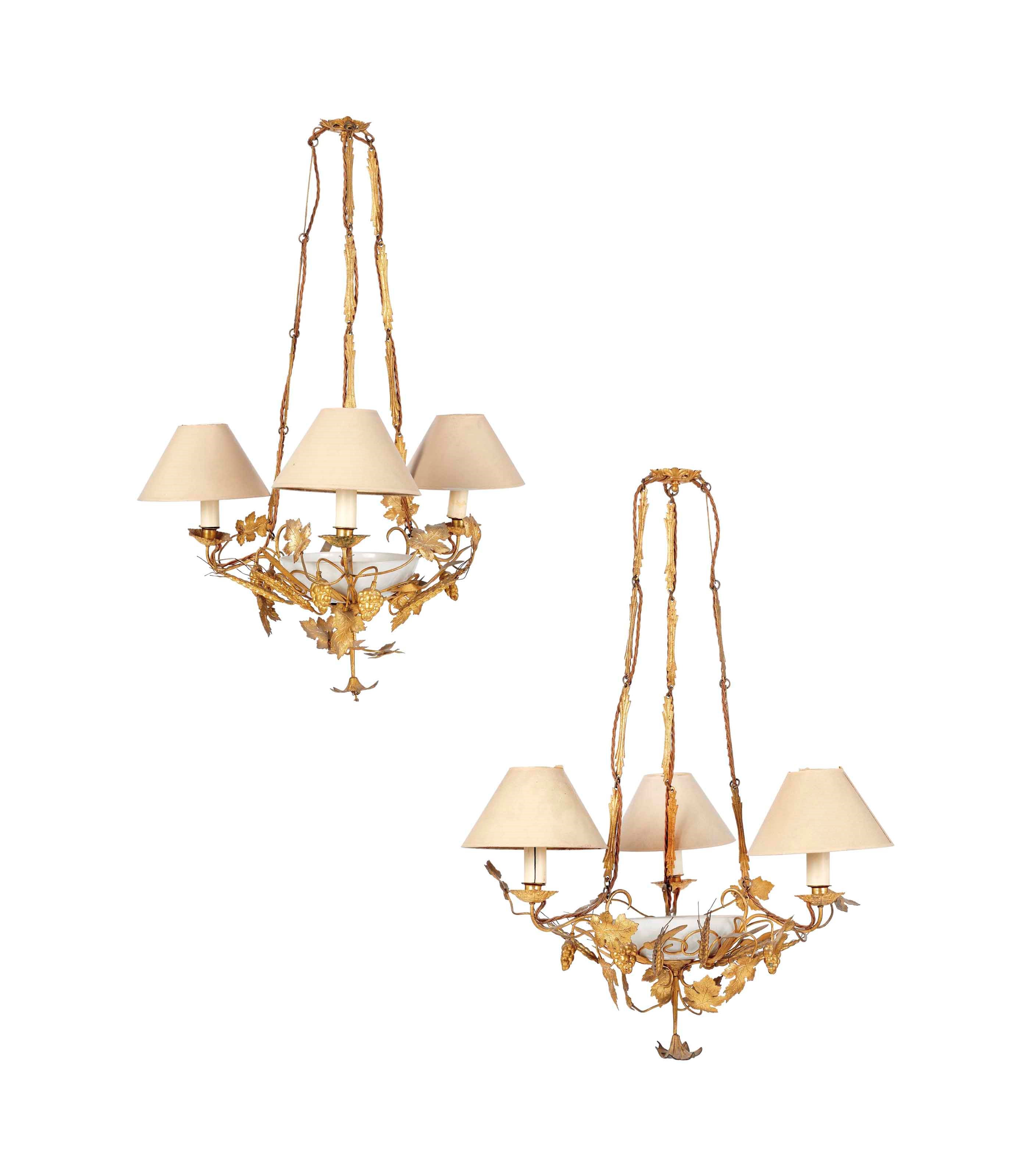 A PAIR OF FRENCH GILT-METAL THREE-LIGHT HANGING LIGHTS